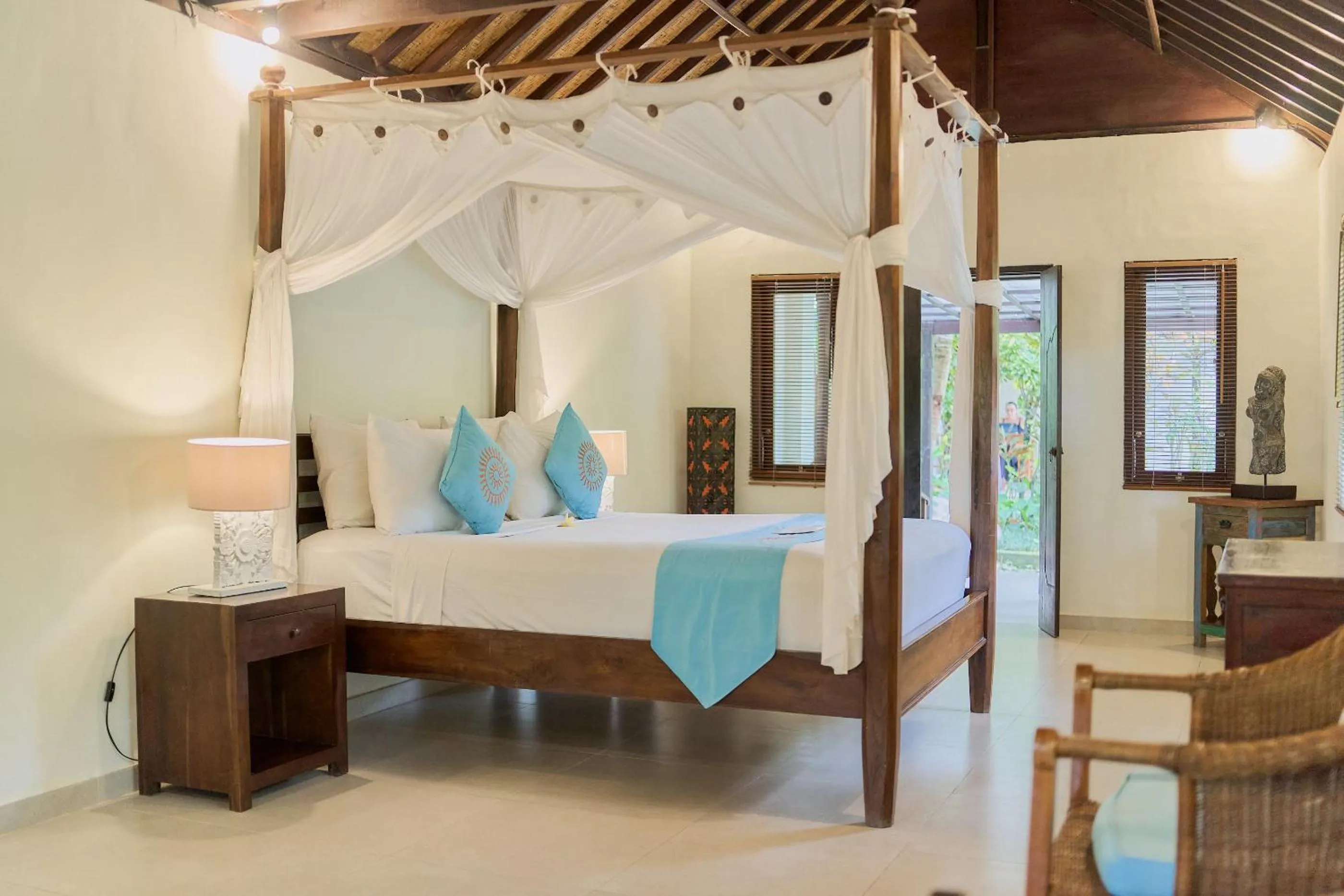 Bed in Sama's Cottages and Villas