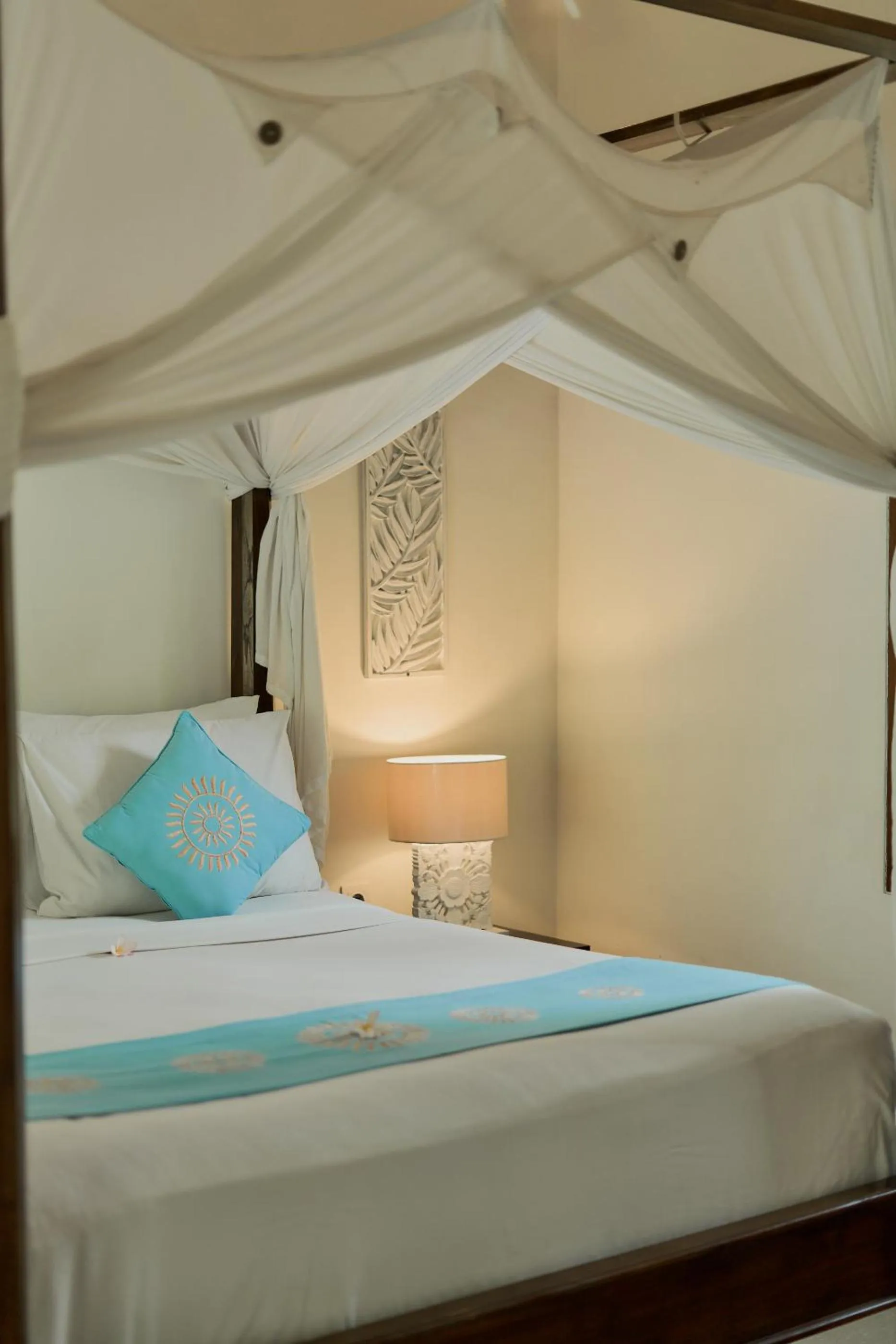 Bed in Sama's Cottages and Villas