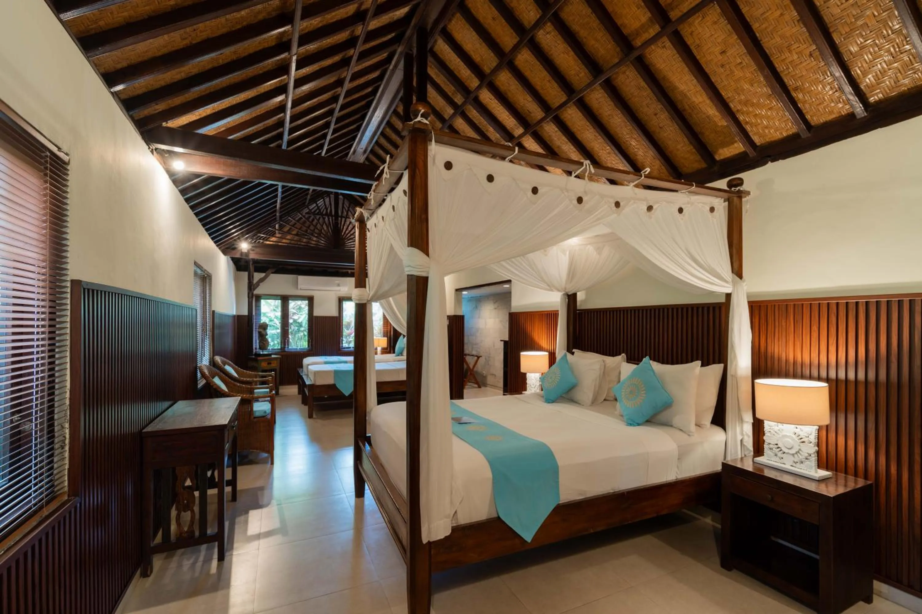 Bed in Sama's Cottages and Villas