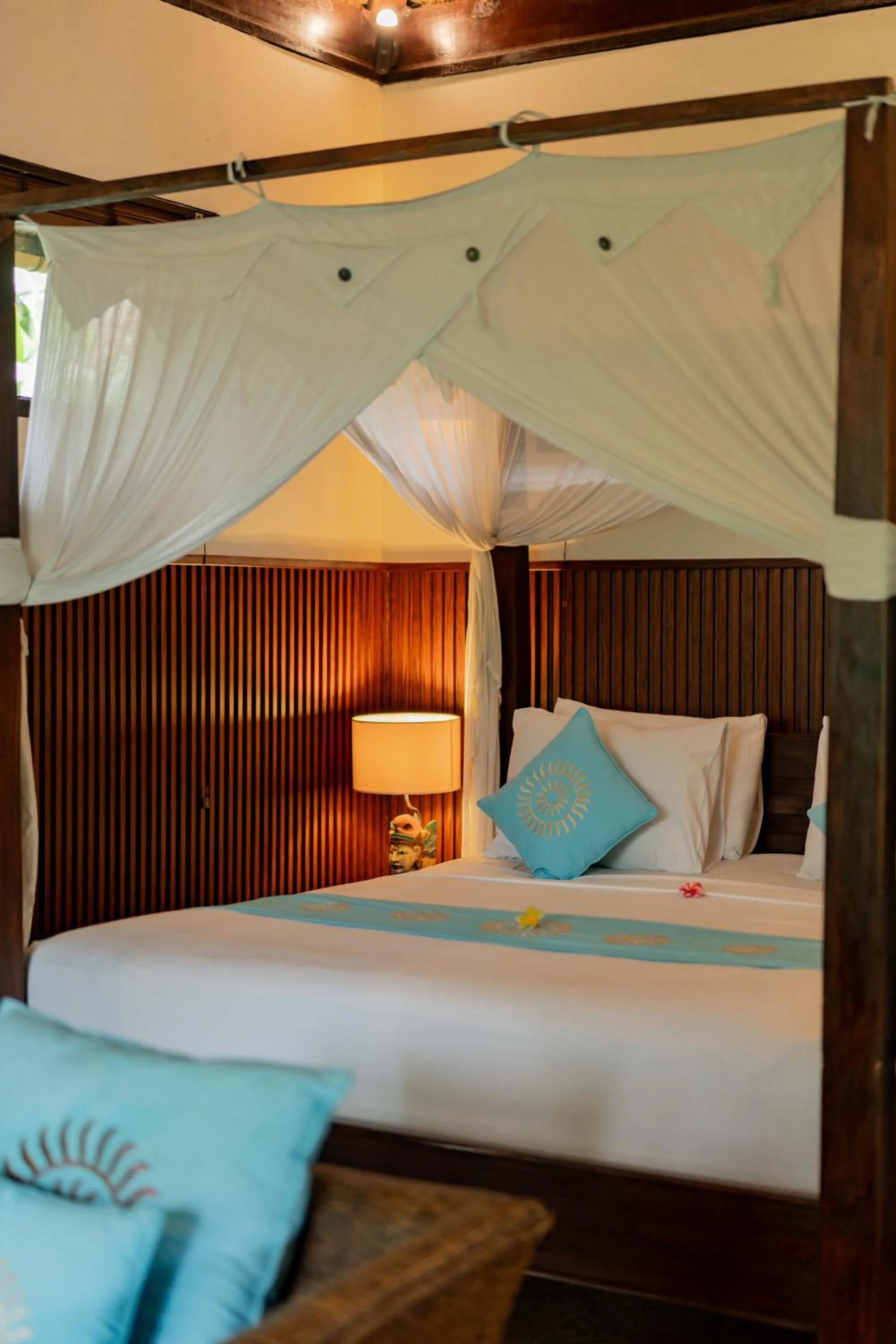 Bed in Sama's Cottages and Villas
