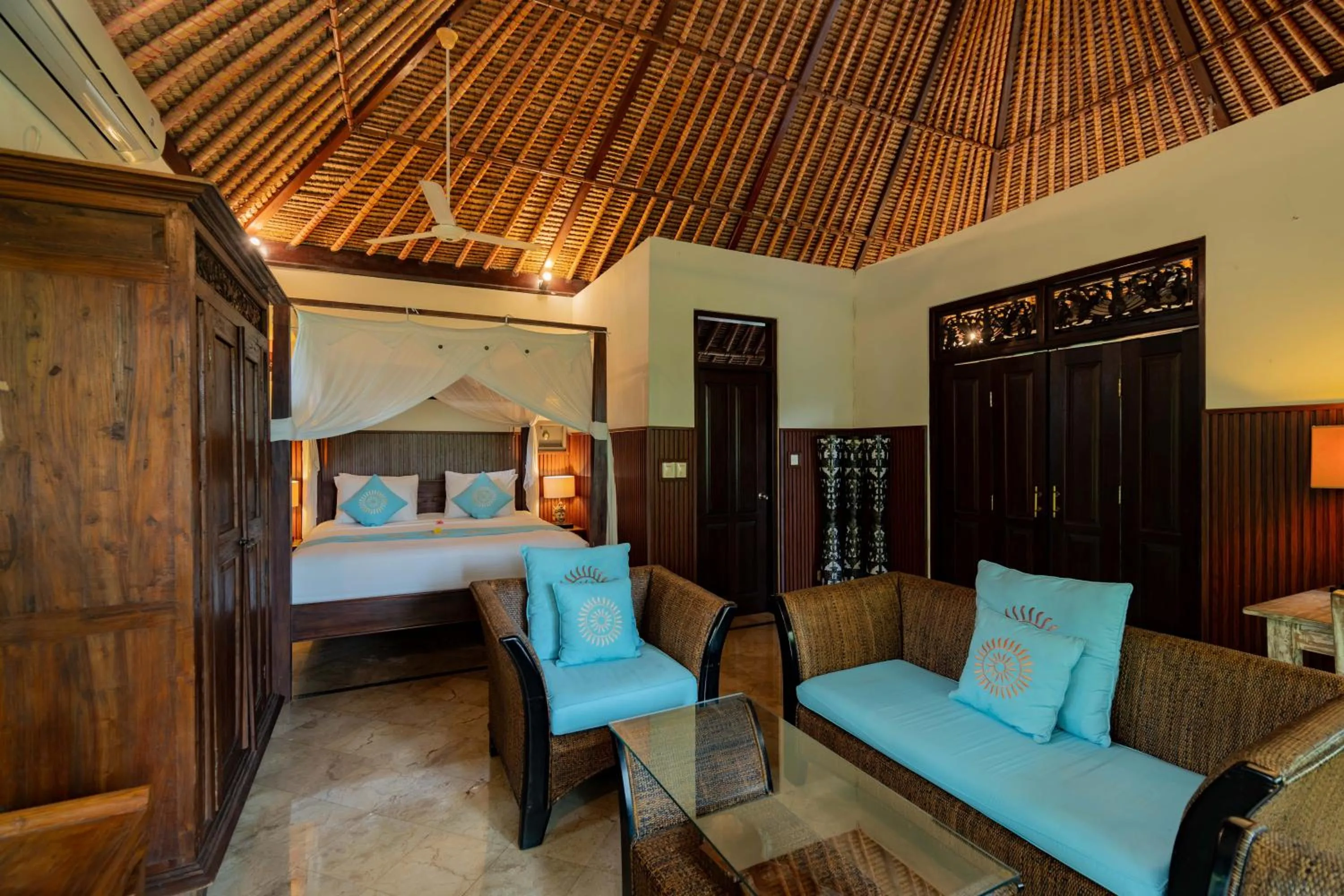 Bed in Sama's Cottages and Villas