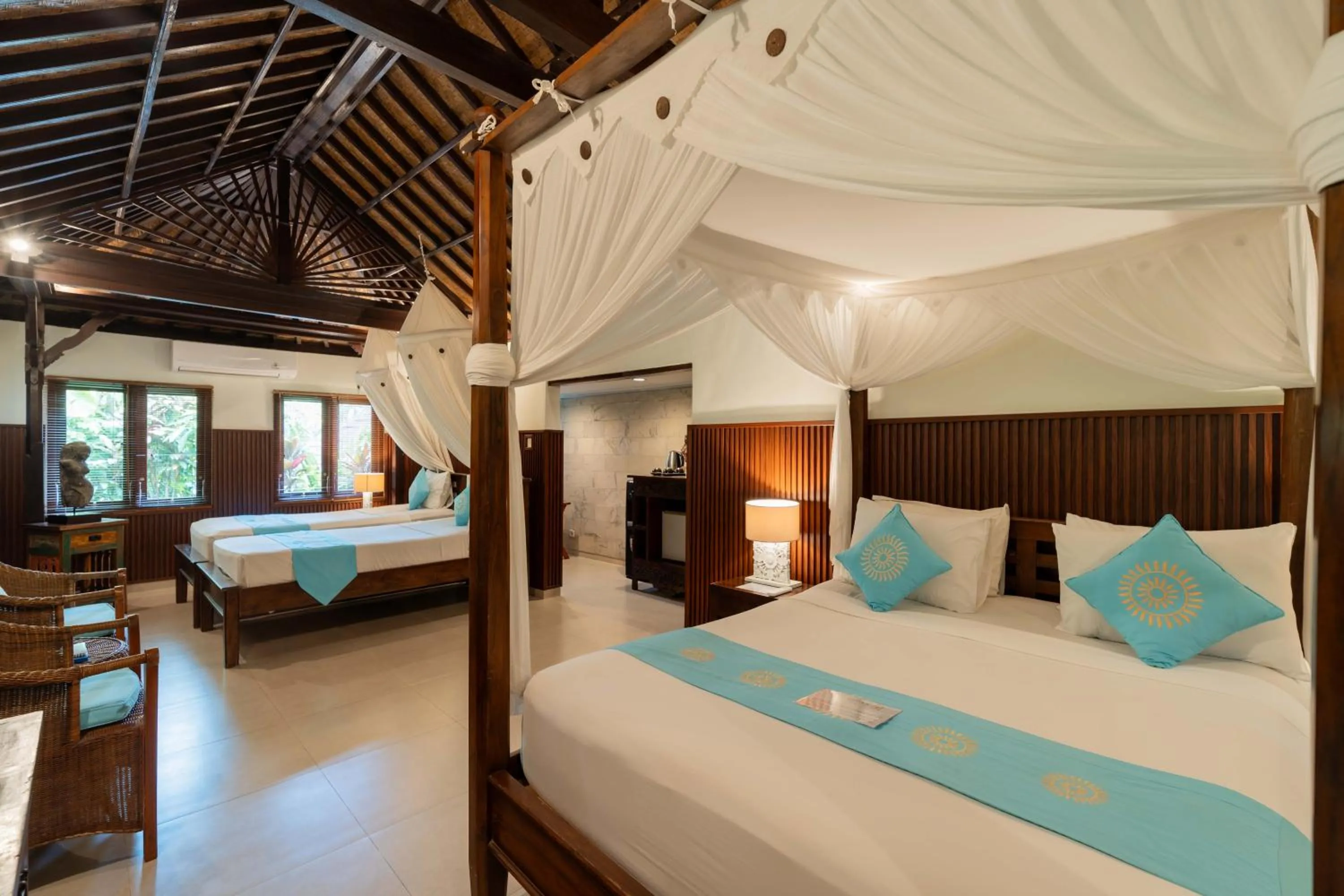 Bed in Sama's Cottages and Villas