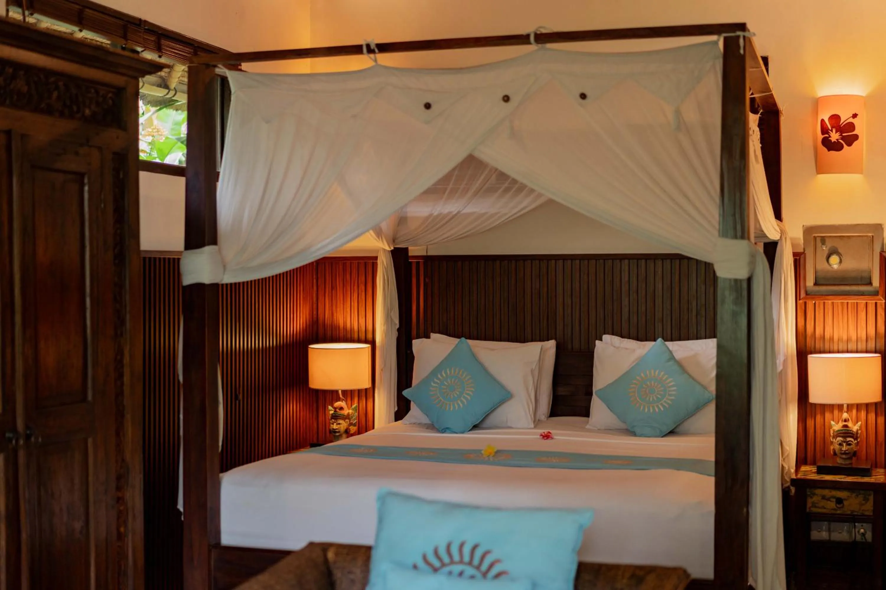 Bed in Sama's Cottages and Villas