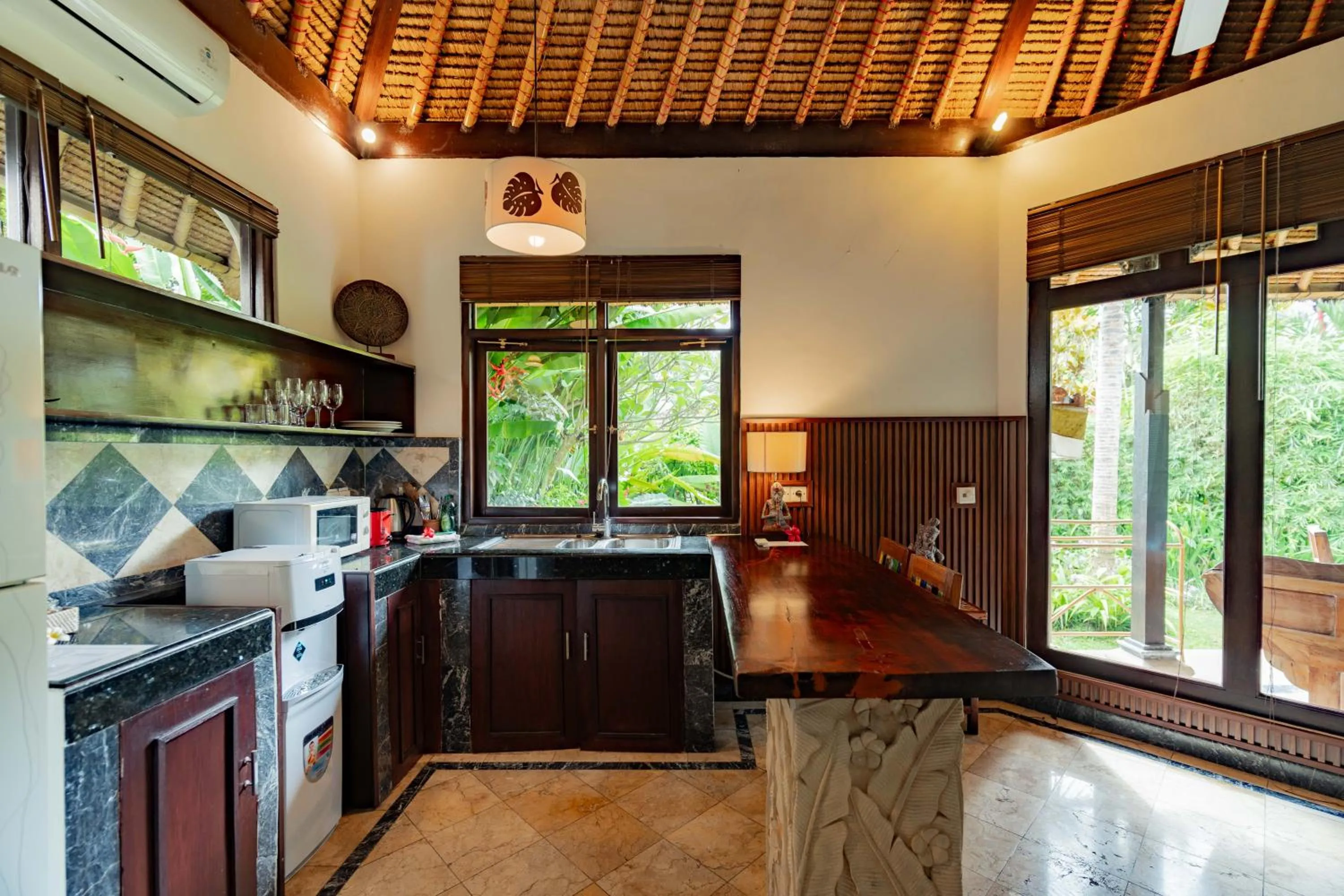 Kitchen or kitchenette in Sama's Cottages and Villas