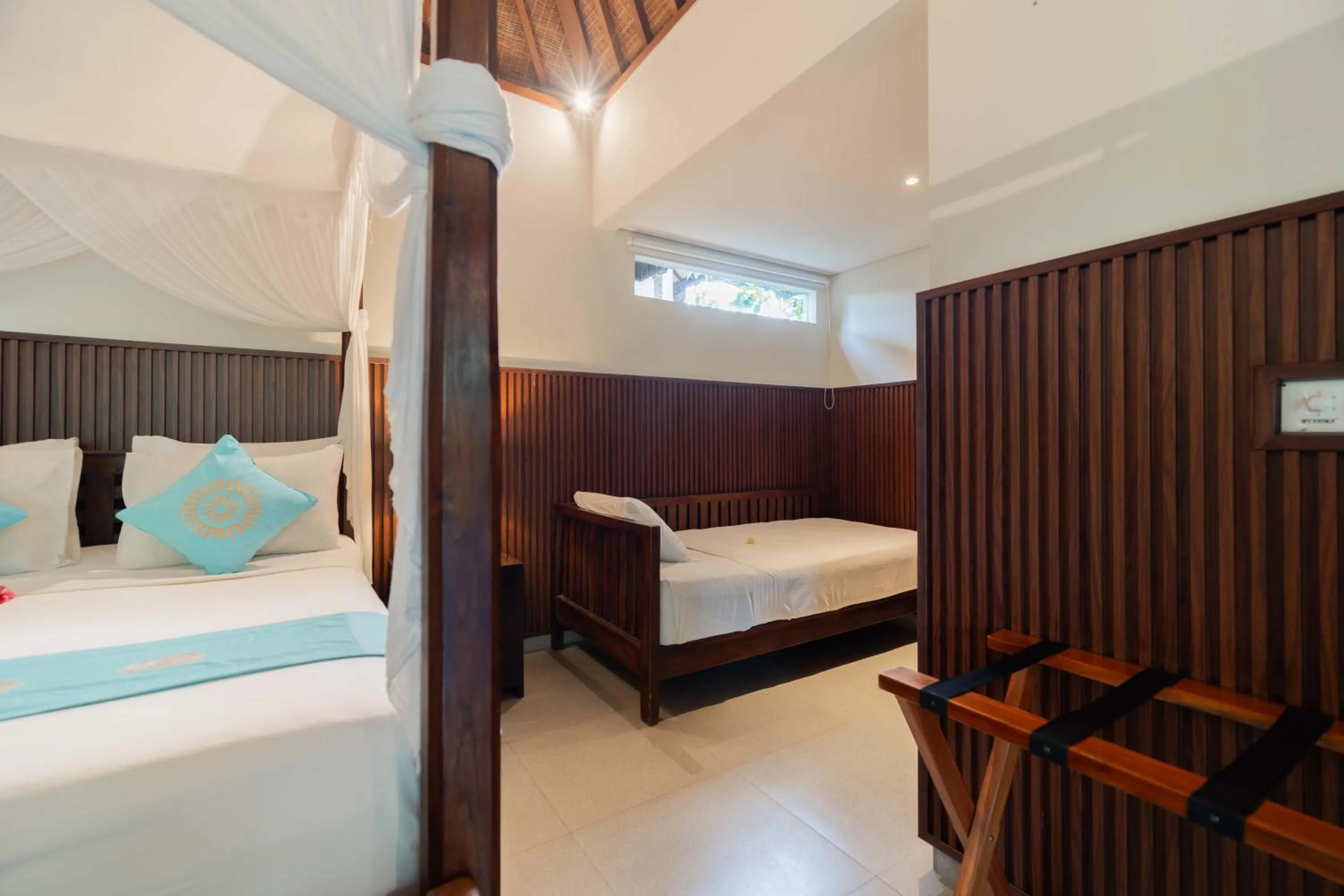 Bed in Sama's Cottages and Villas