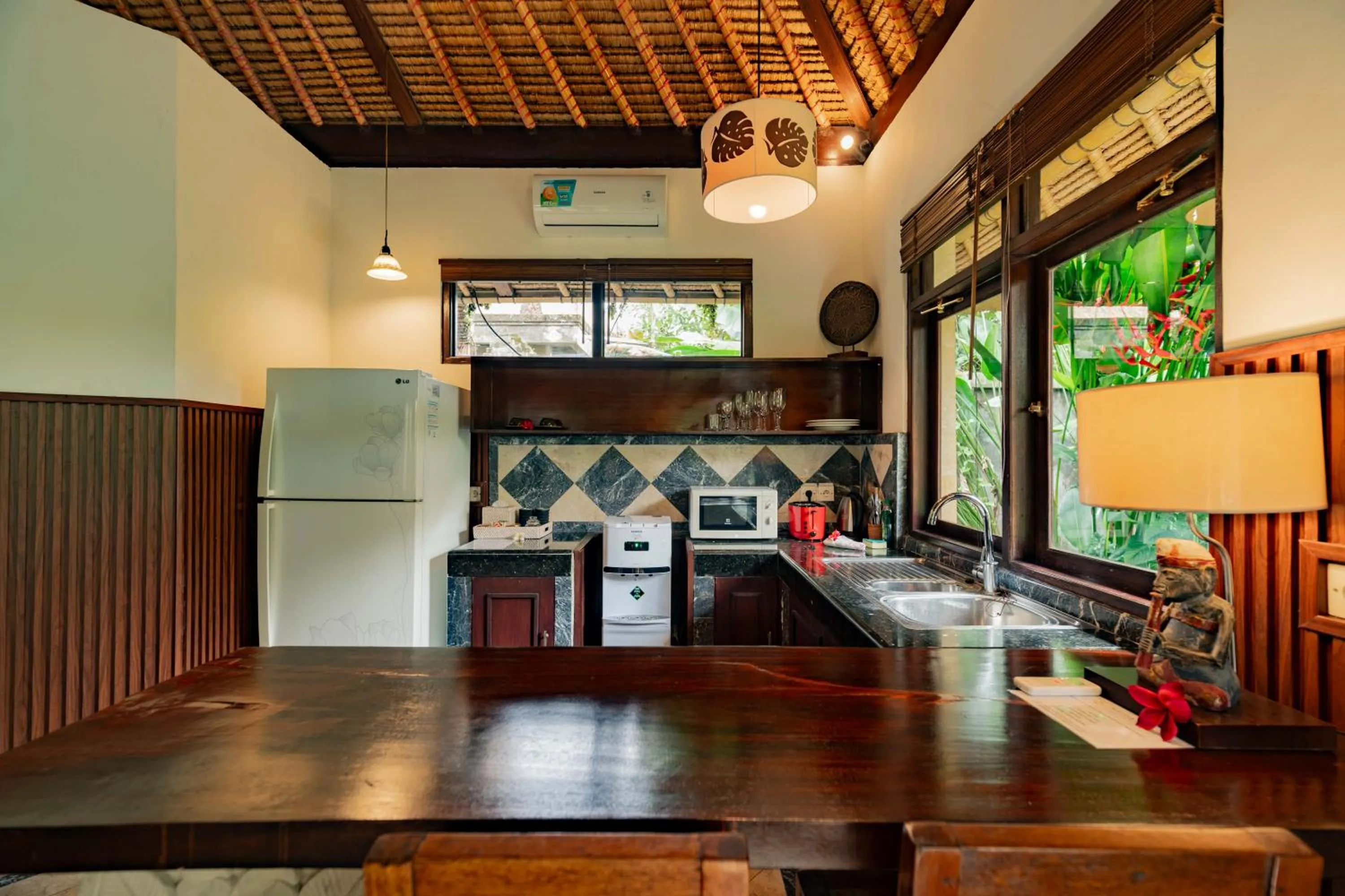 Kitchen or kitchenette in Sama's Cottages and Villas