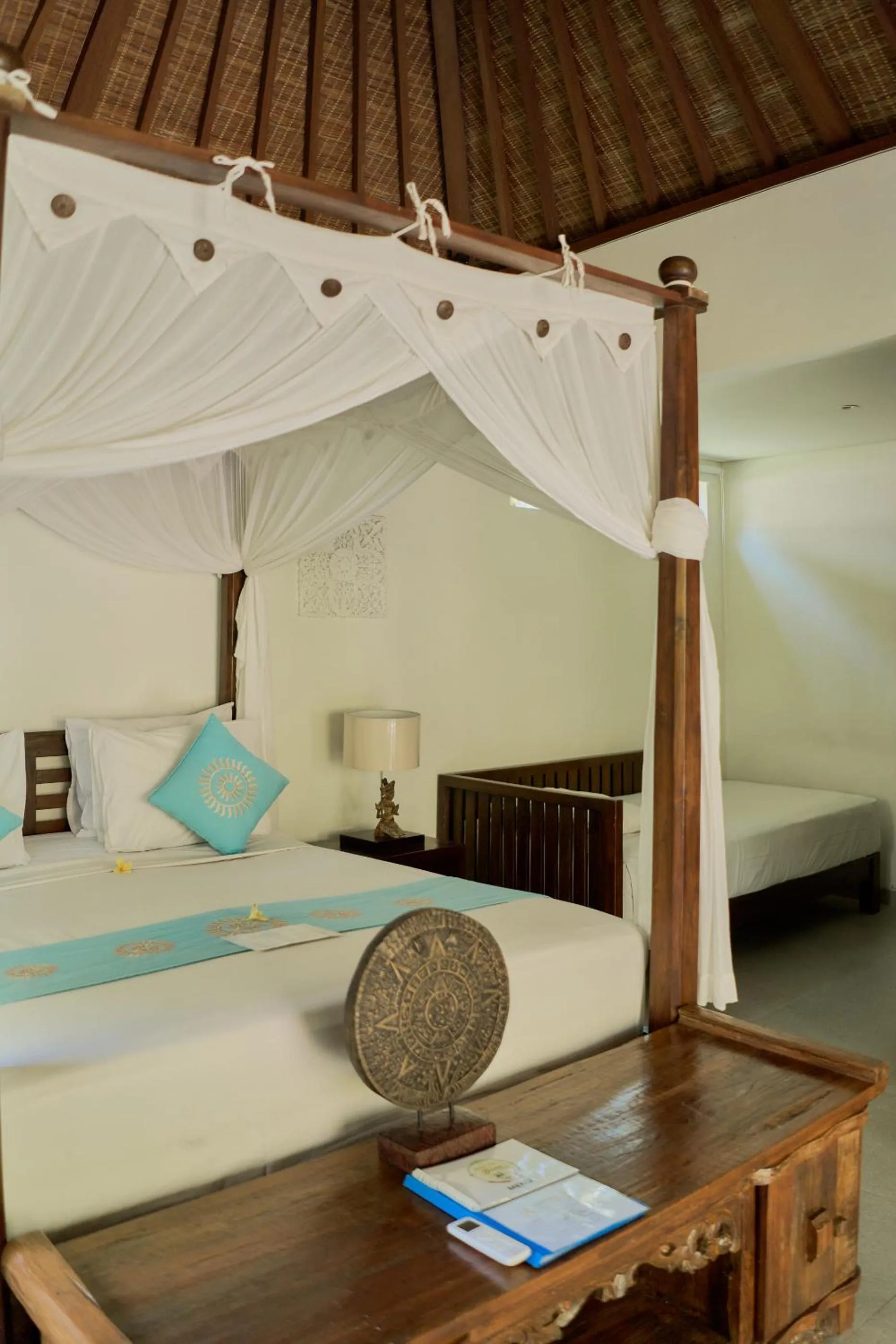 Bed in Sama's Cottages and Villas