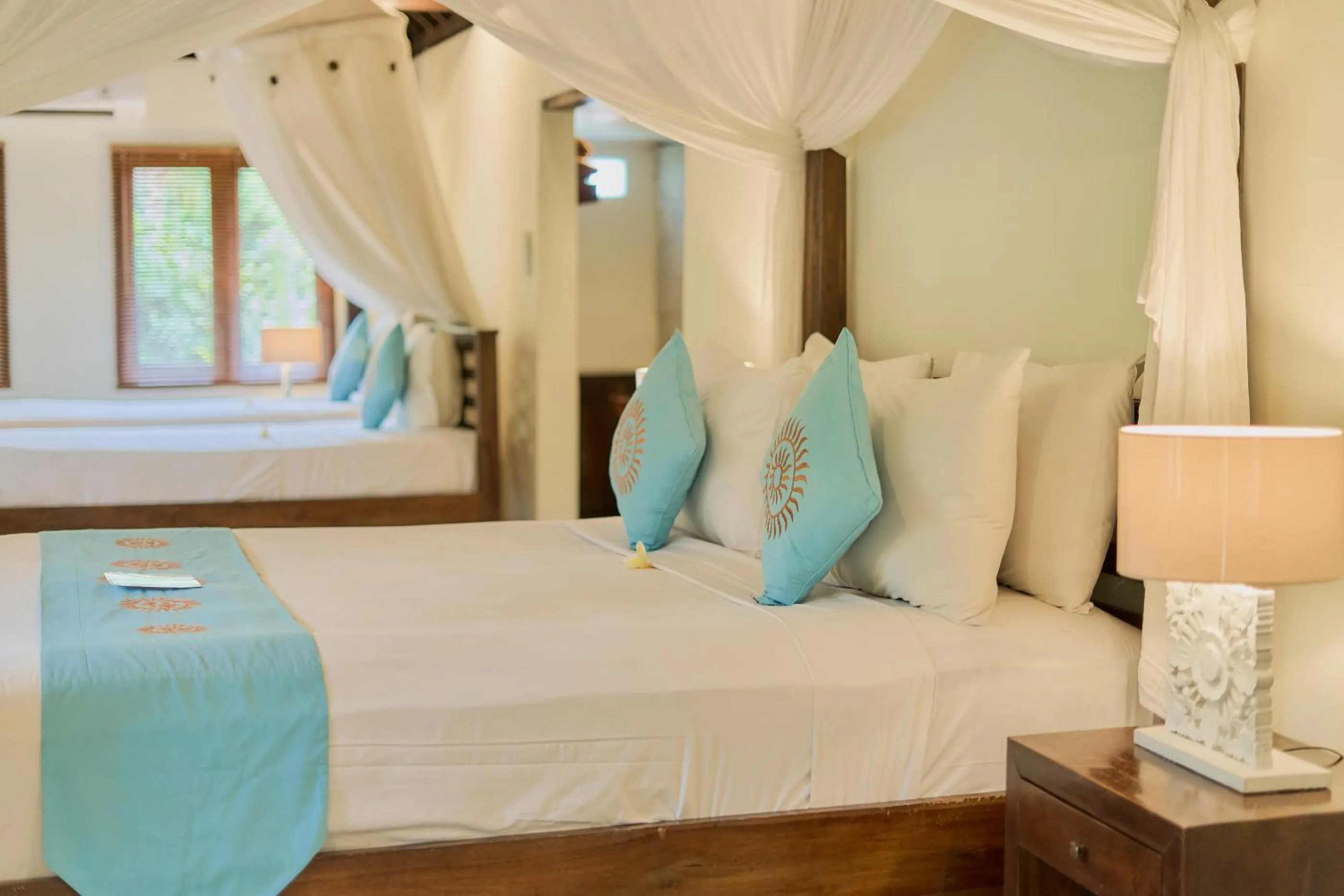 Bed in Sama's Cottages and Villas