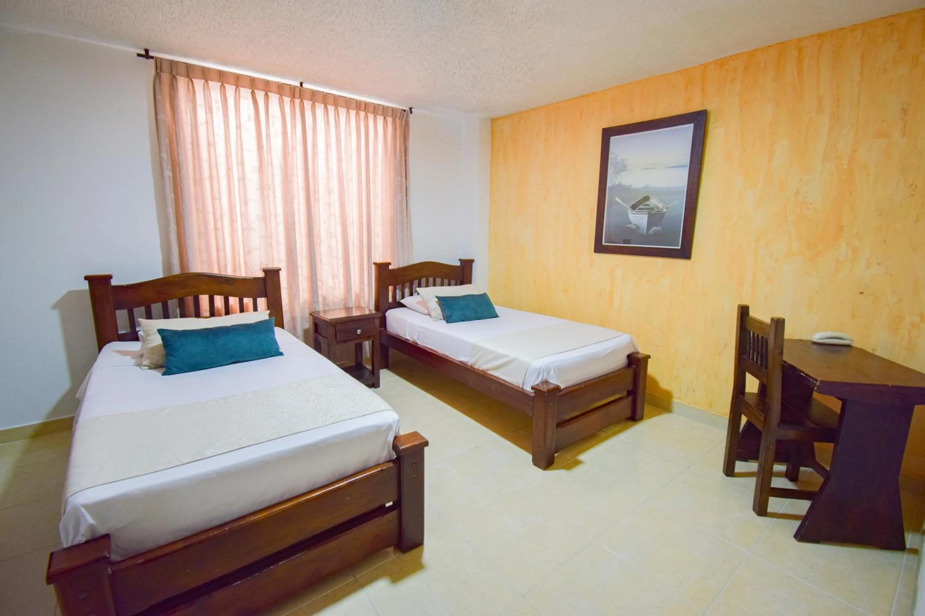 Bed in Hotel Toledo Plaza