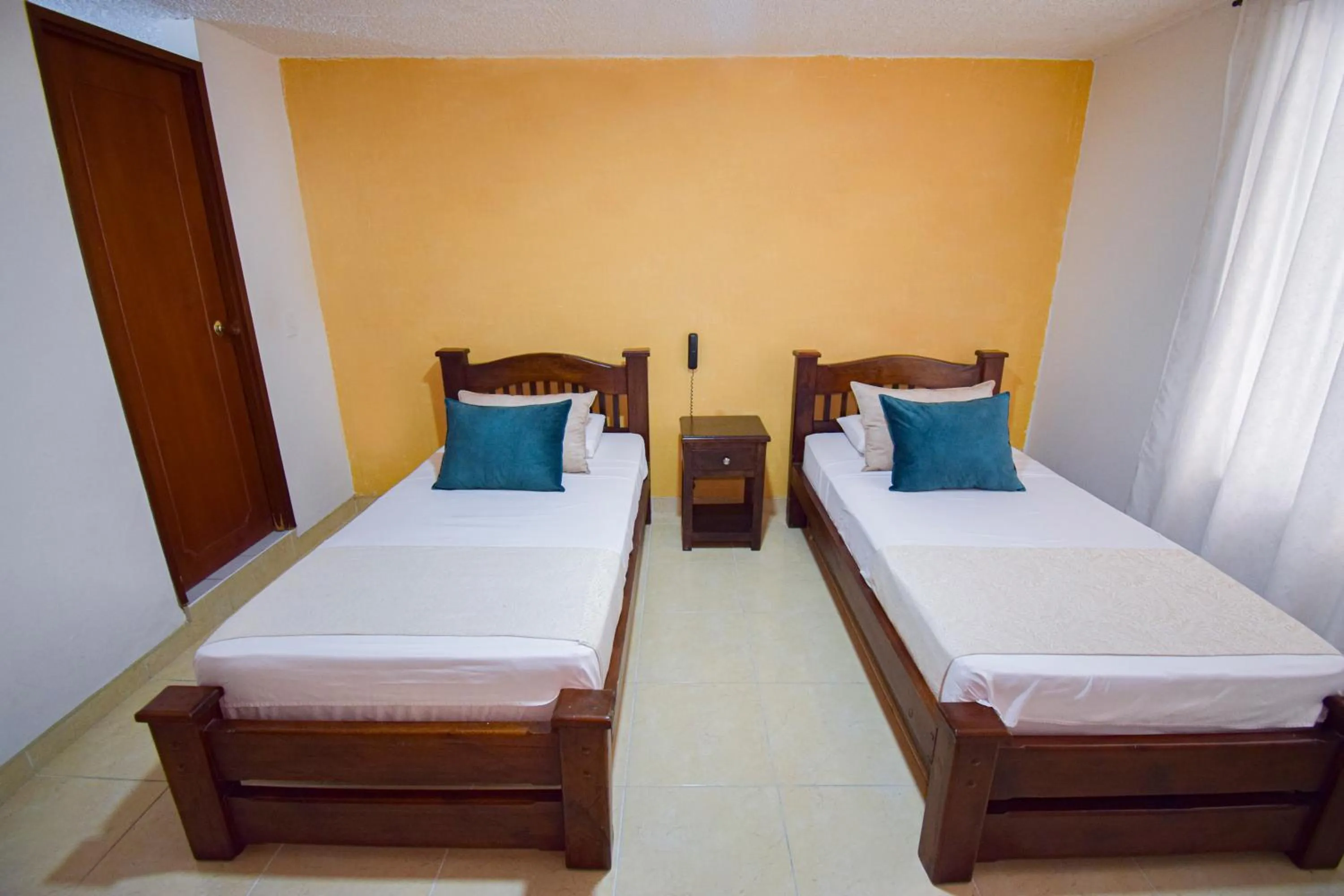 Bed in Hotel Toledo Plaza