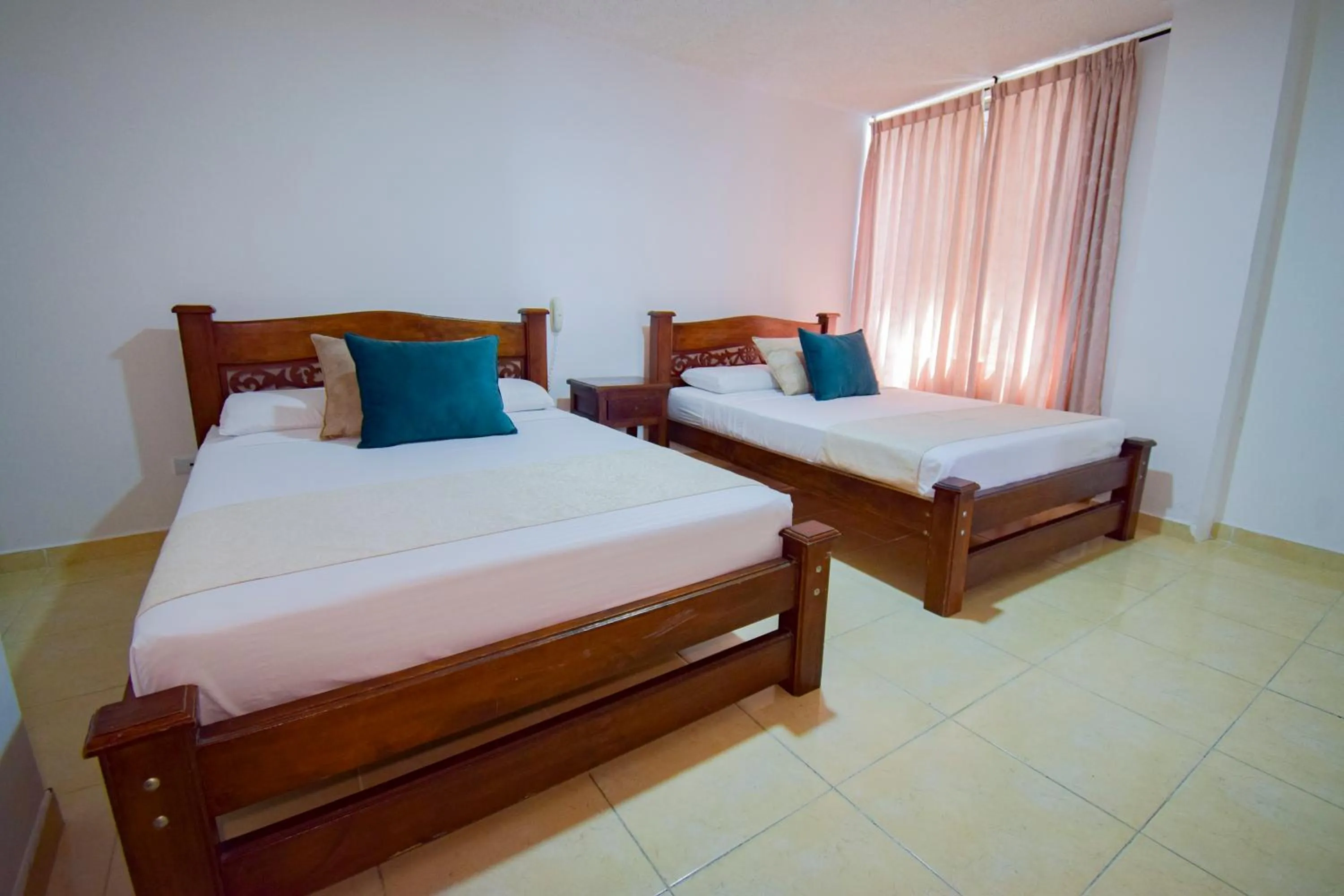 Bed in Hotel Toledo Plaza