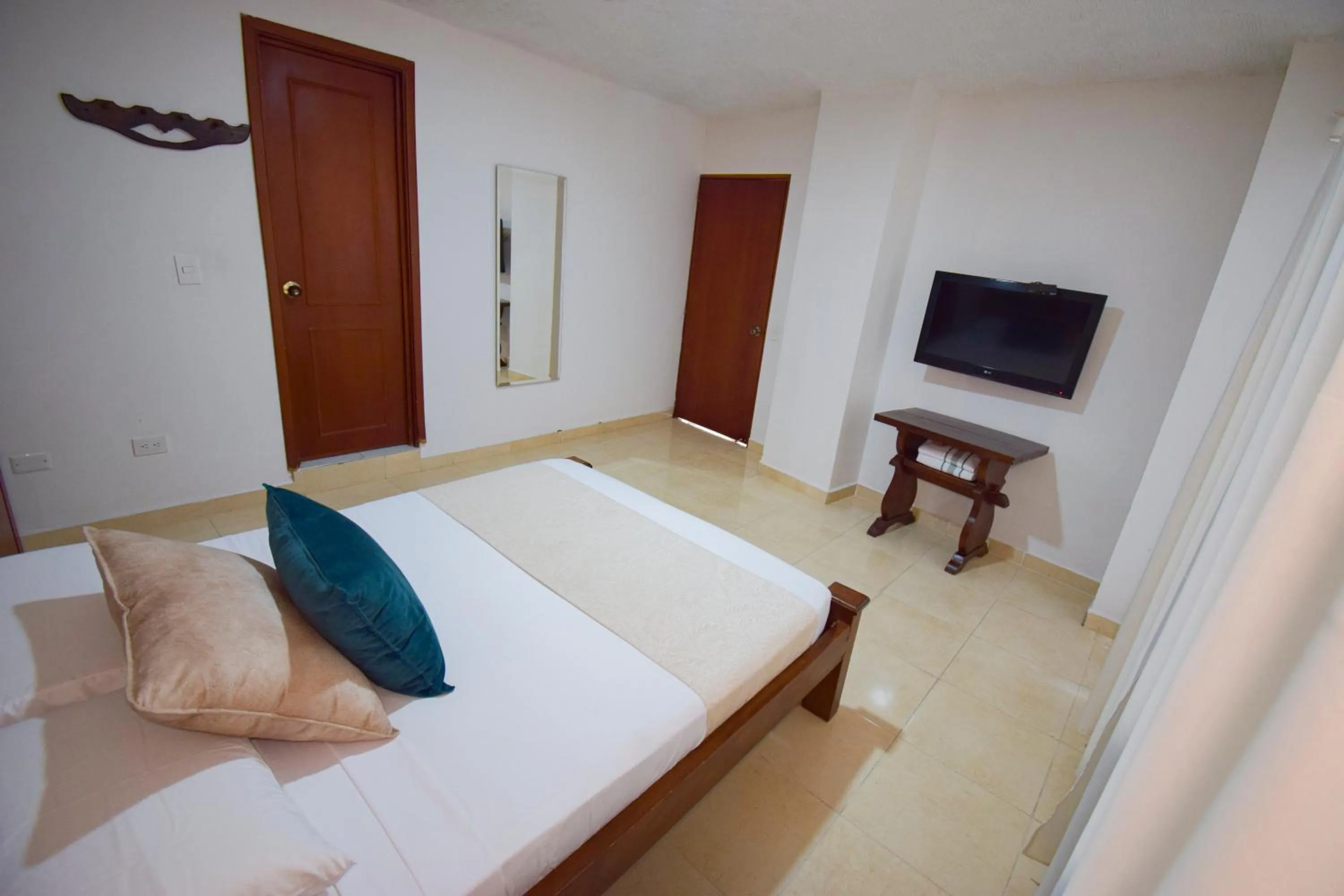 Bed in Hotel Toledo Plaza