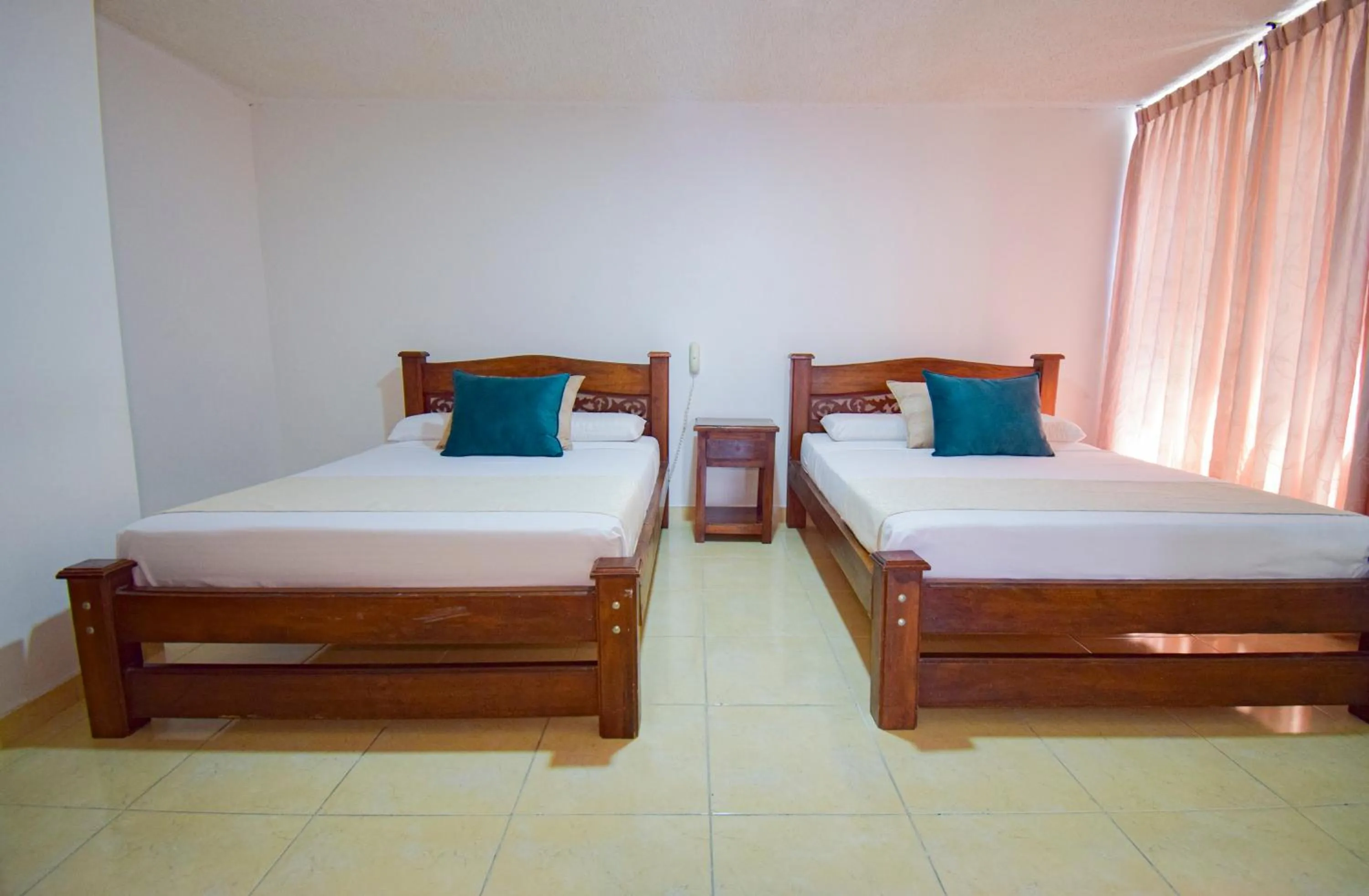 Bed in Hotel Toledo Plaza