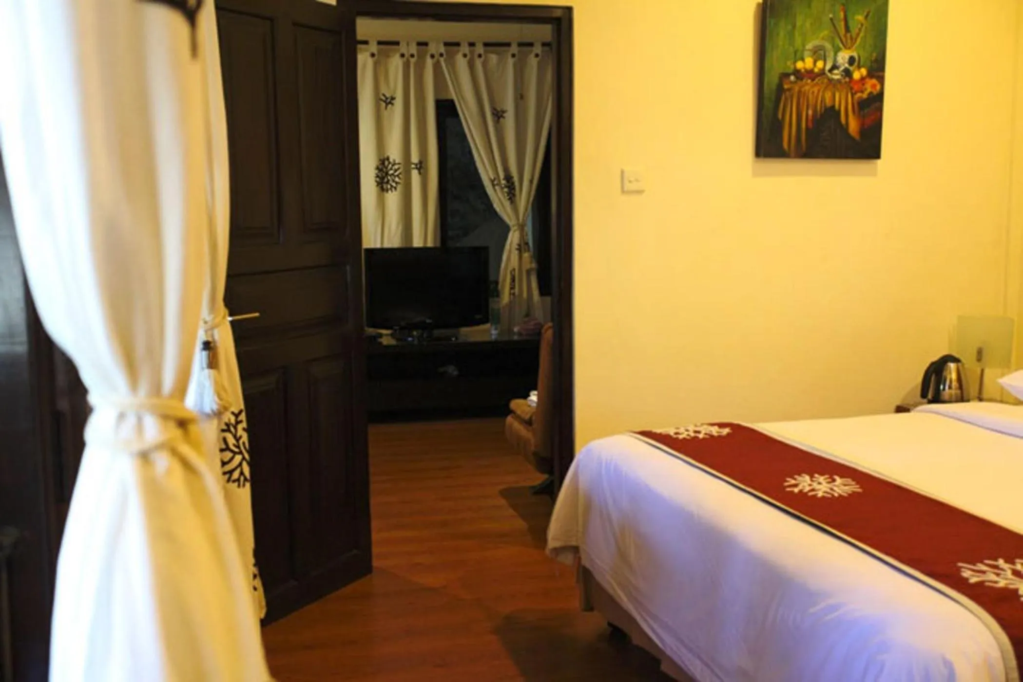 Bed in Niramaya Villa