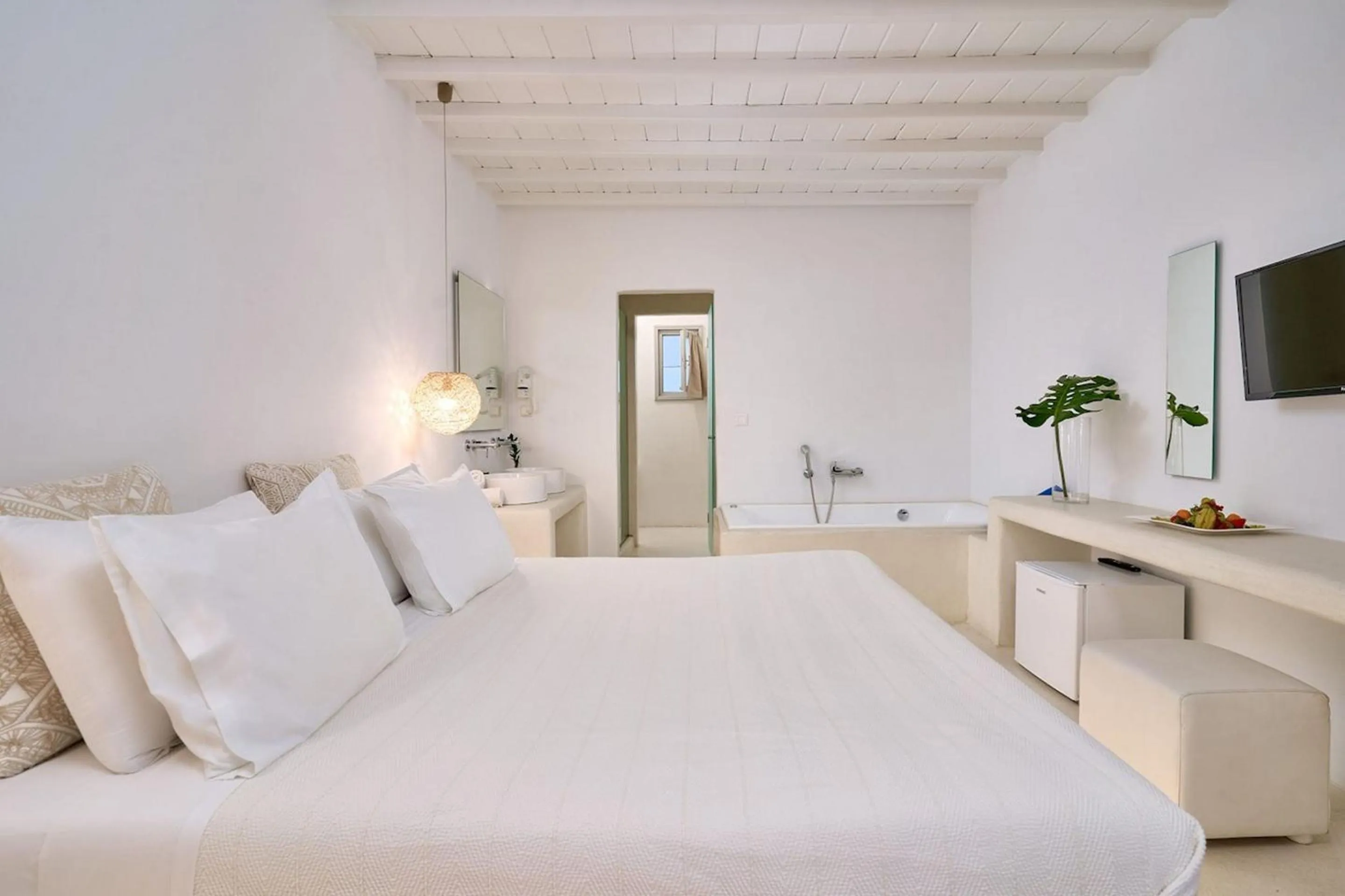 Bed in Paolas Τown Boutique Hotel