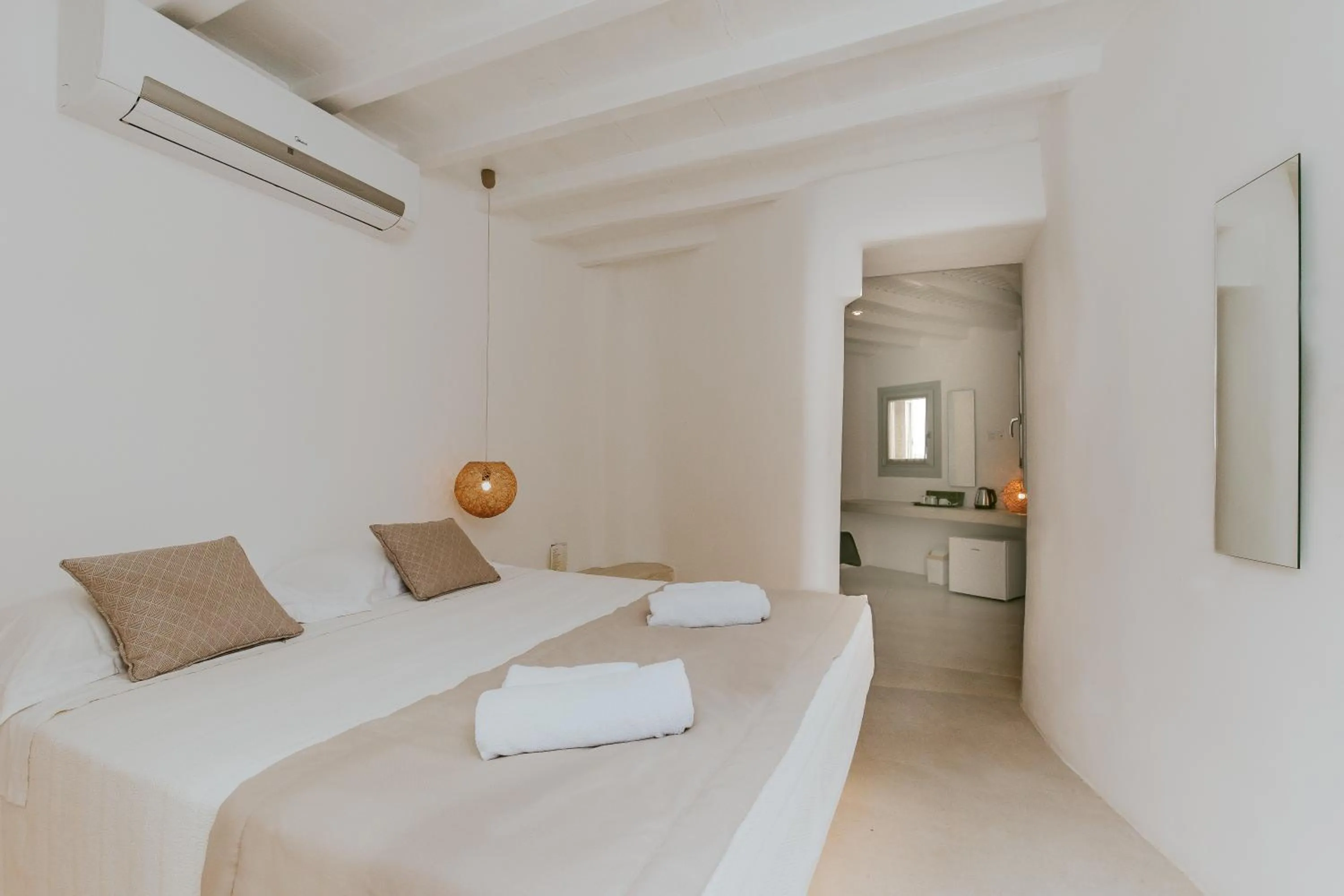 Bed in Paolas Τown Boutique Hotel