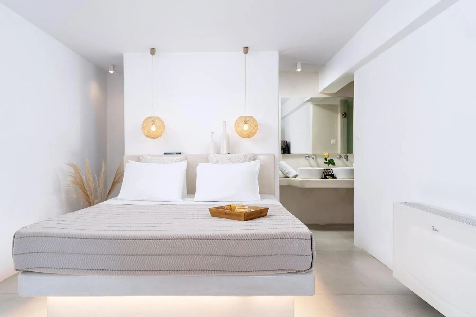 Bed in Paolas Τown Boutique Hotel