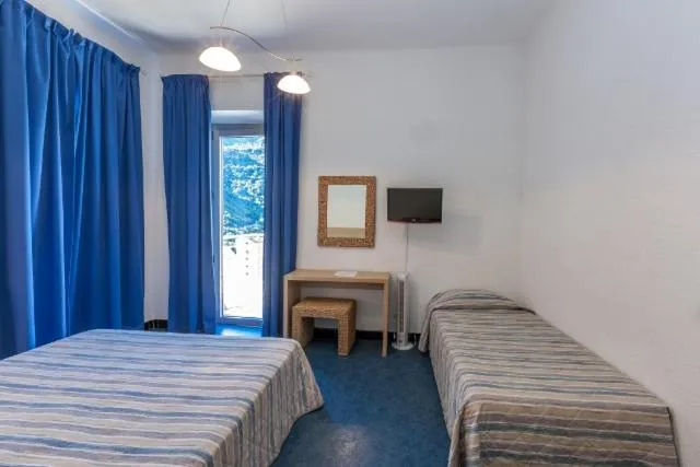 Bed in Hôtel Colombo- Porto Corse