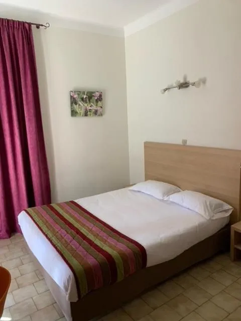 Bed in Hôtel Colombo- Porto Corse