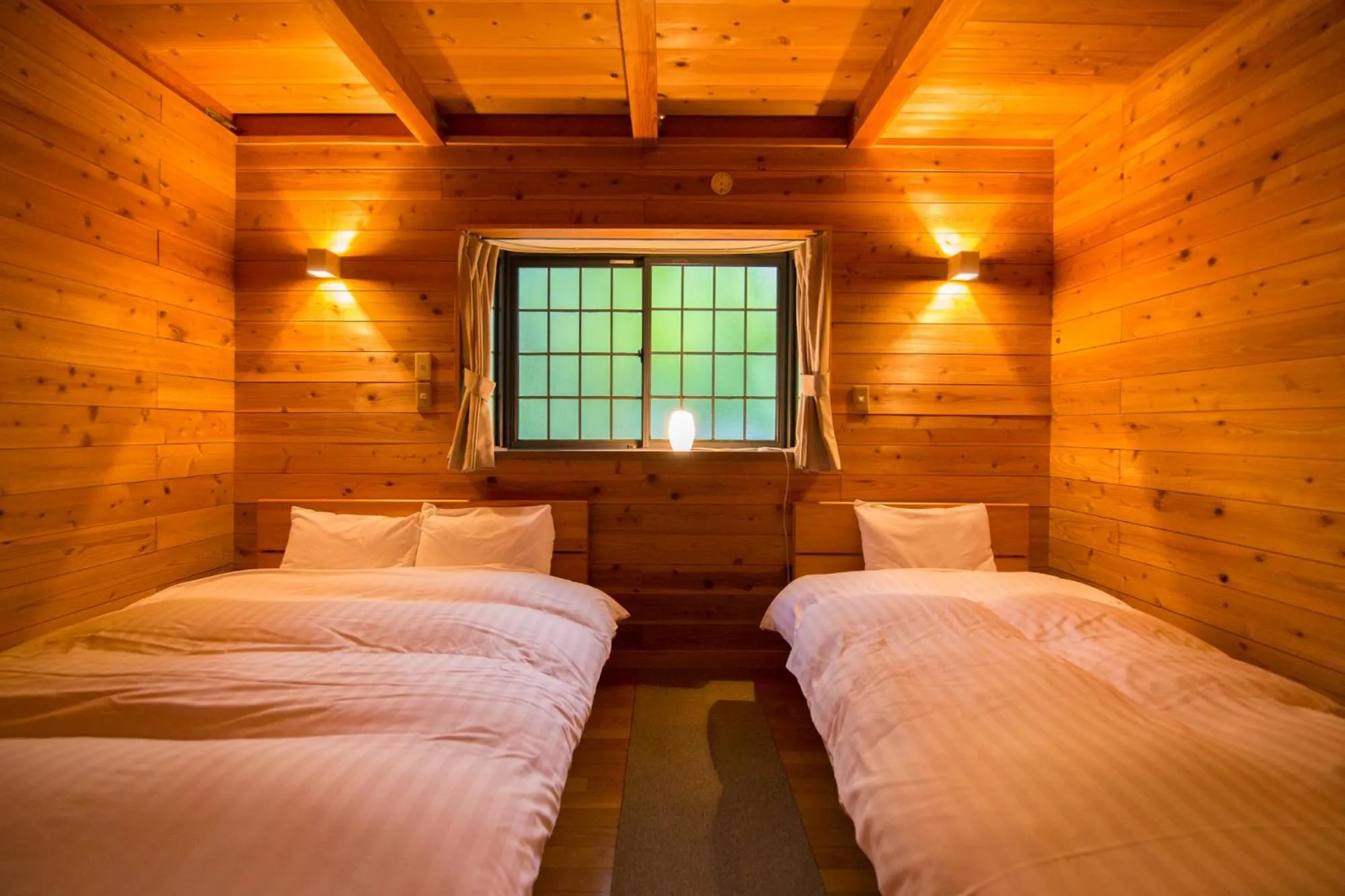 Photo of the whole room, Bed in Yufuin Tsukahara Kogen Sanso Donguri
