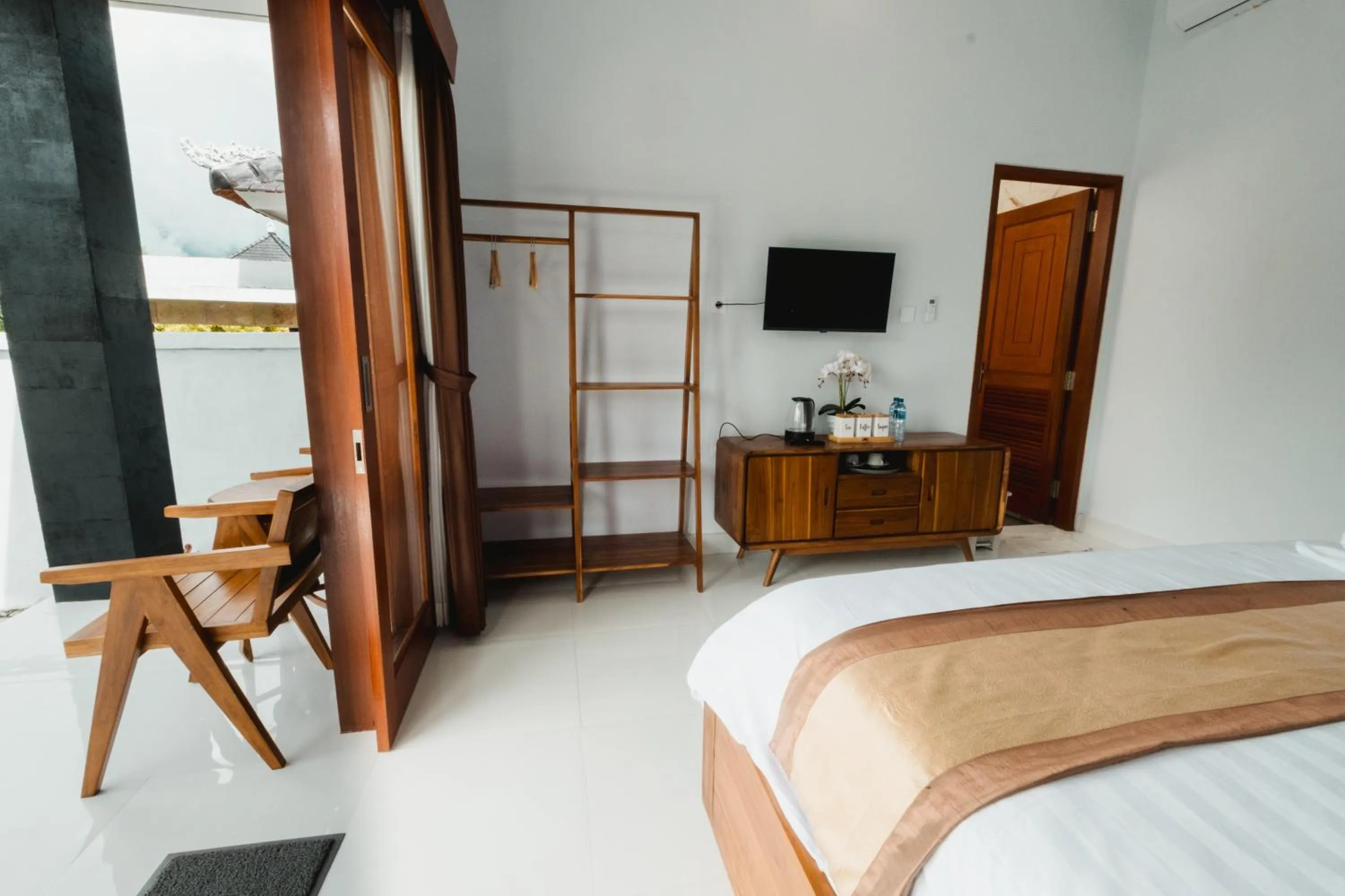Communal lounge/ TV room, Bed in Mount Batur Villa