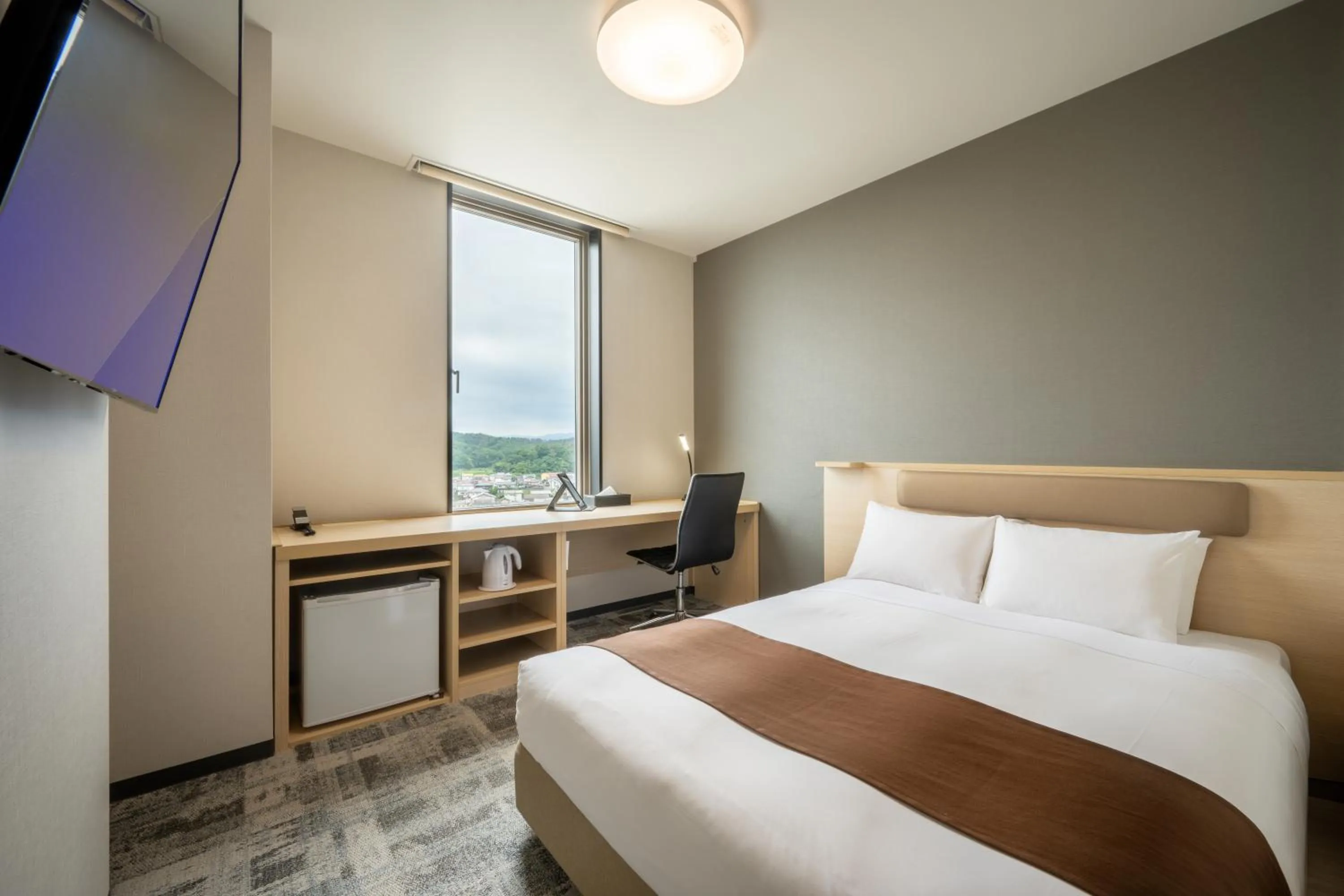 Photo of the whole room, Bed in Hotel Maruya Grande