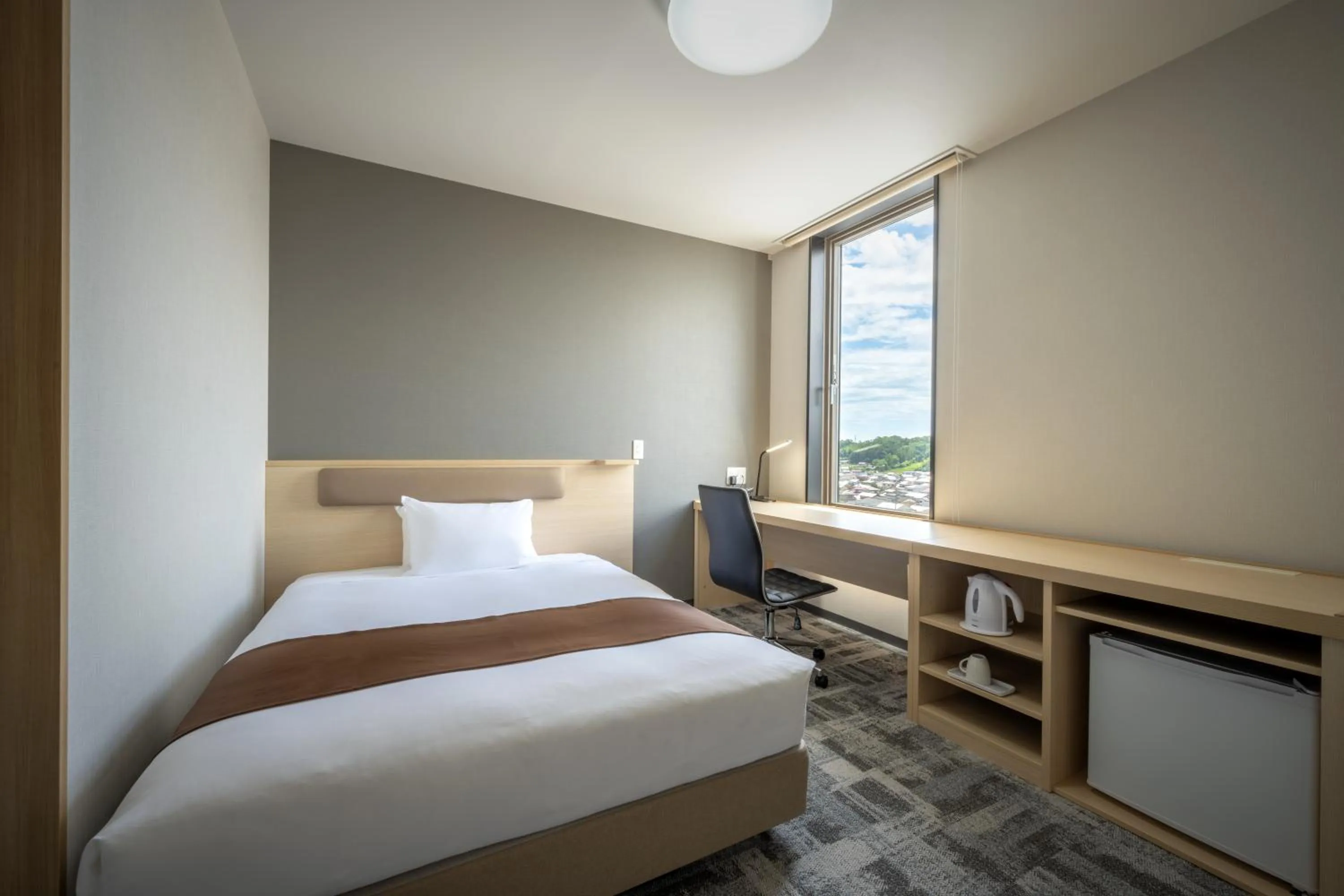 Photo of the whole room, Bed in Hotel Maruya Grande