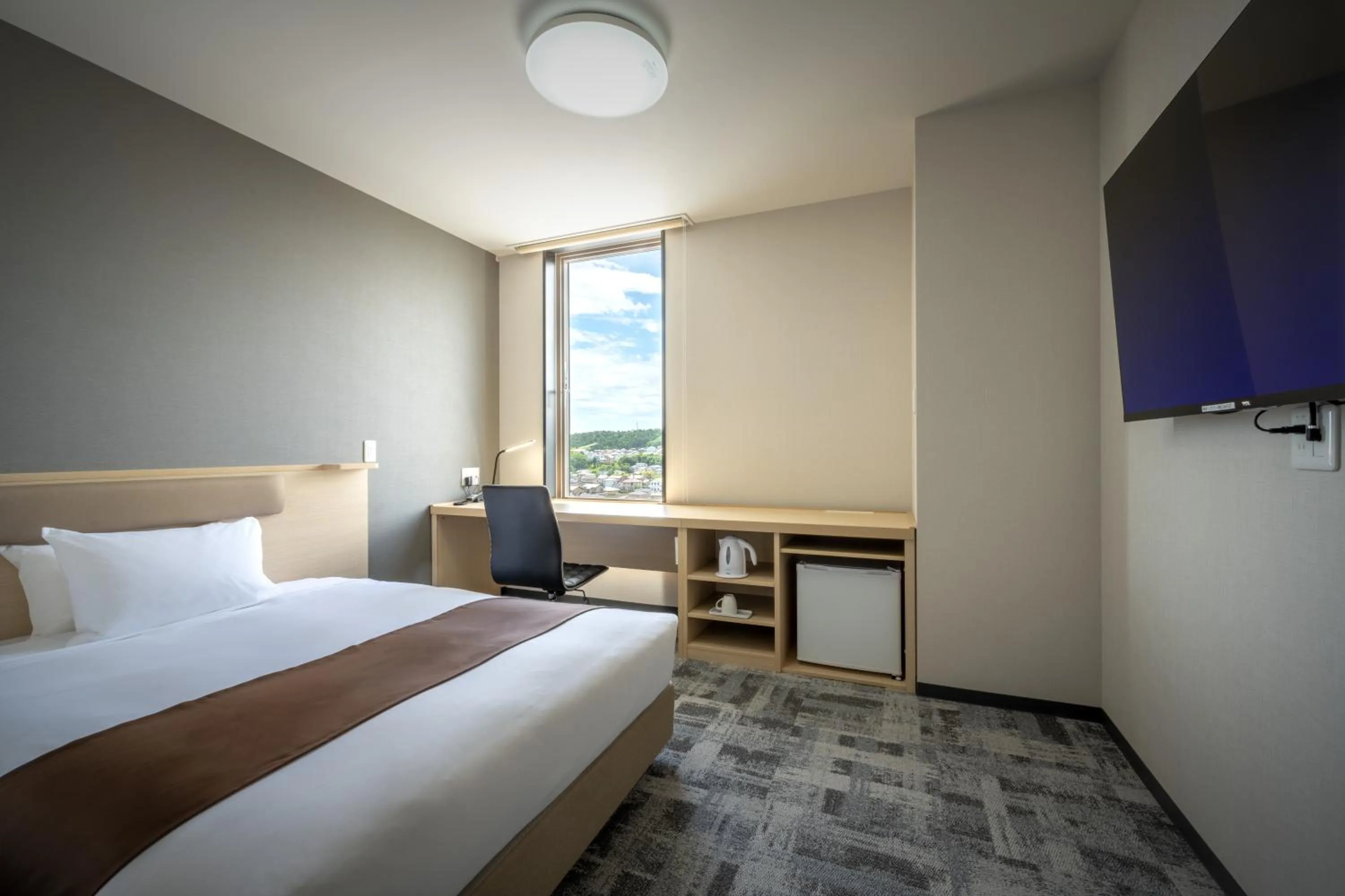 Photo of the whole room, Bed in Hotel Maruya Grande