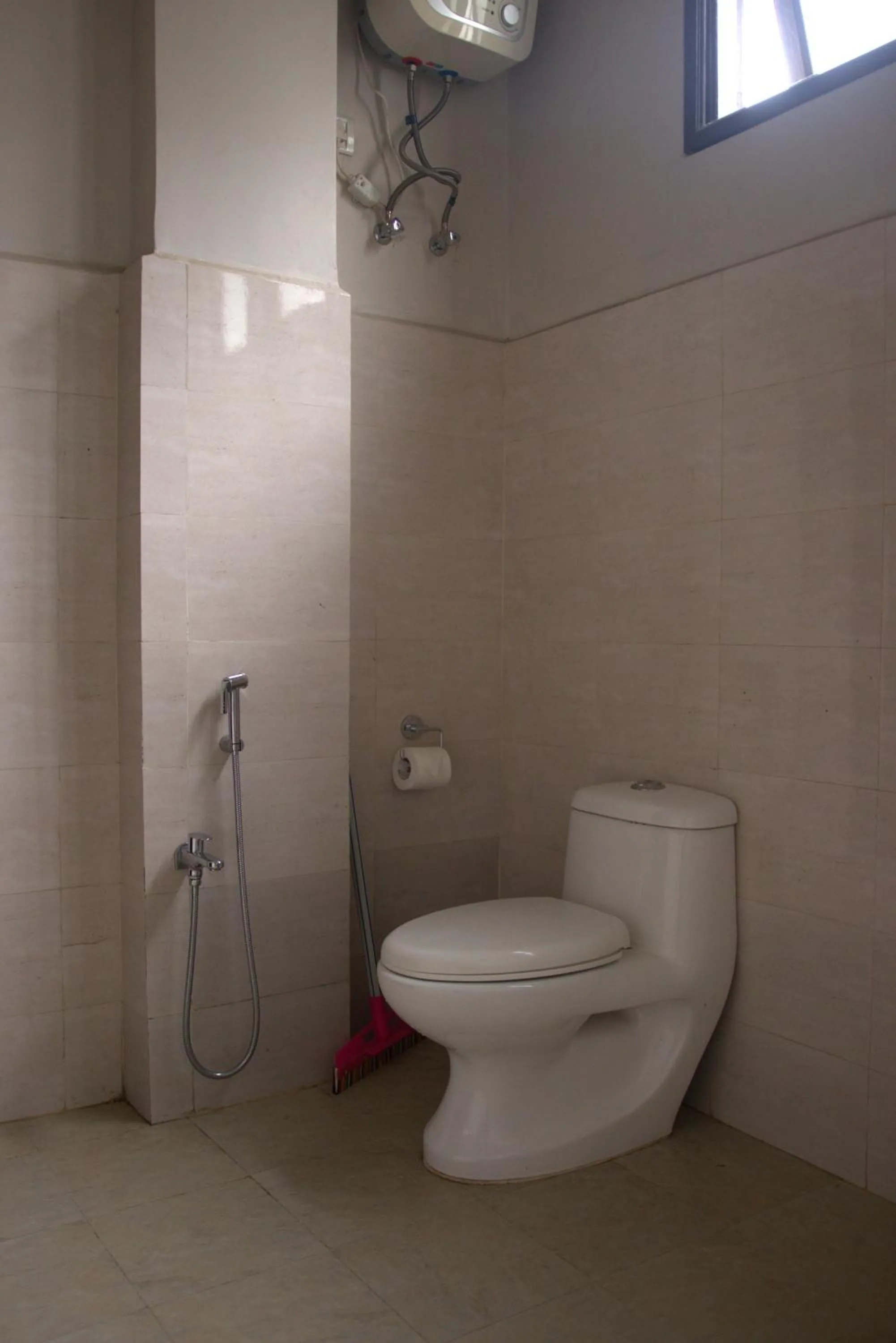 Bathroom in Akim Homestay