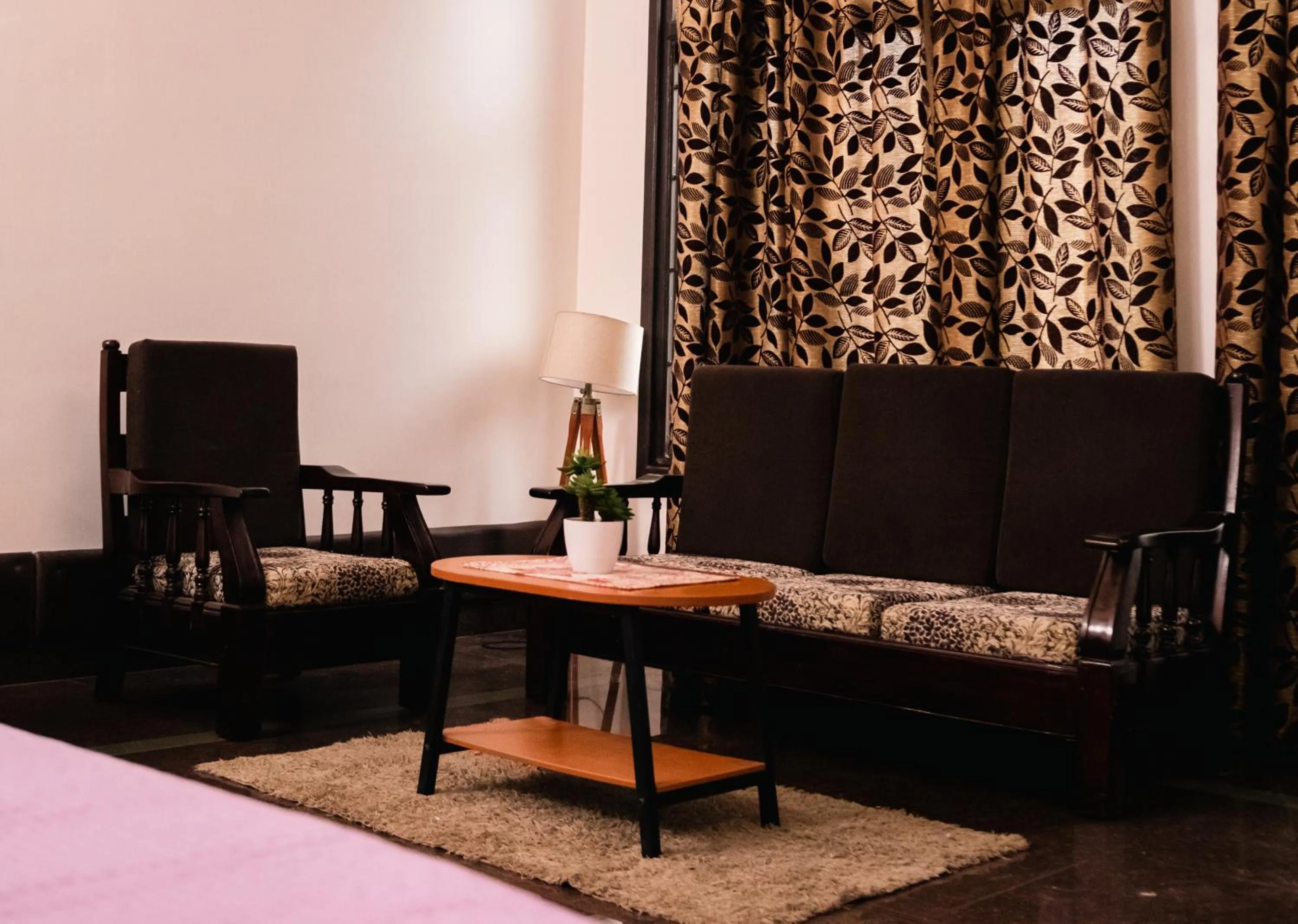 Living room, Bed in Akim Homestay