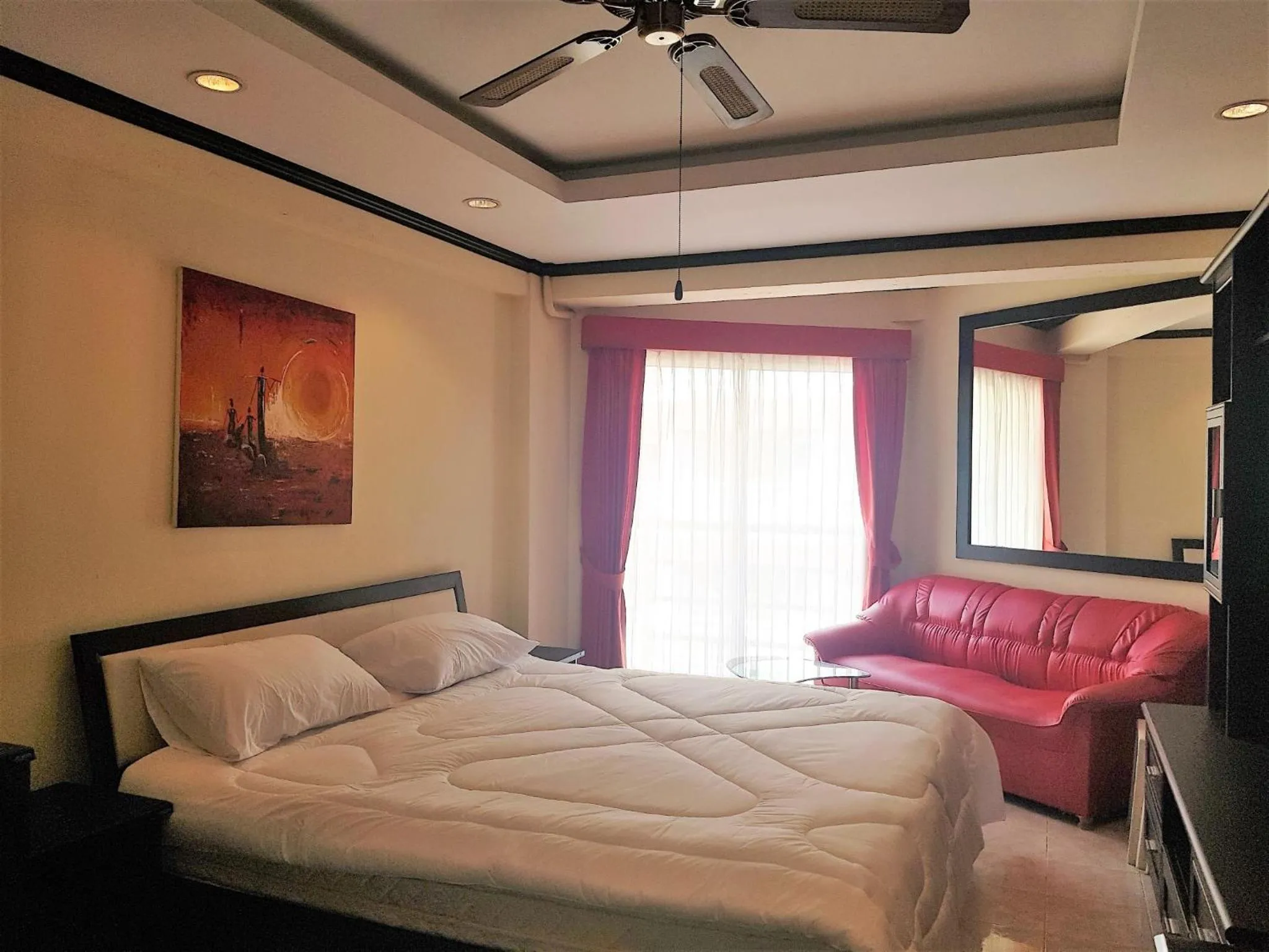 Seating area, Bed in Jomtien beach condo sea view studio apartment 12th floor
