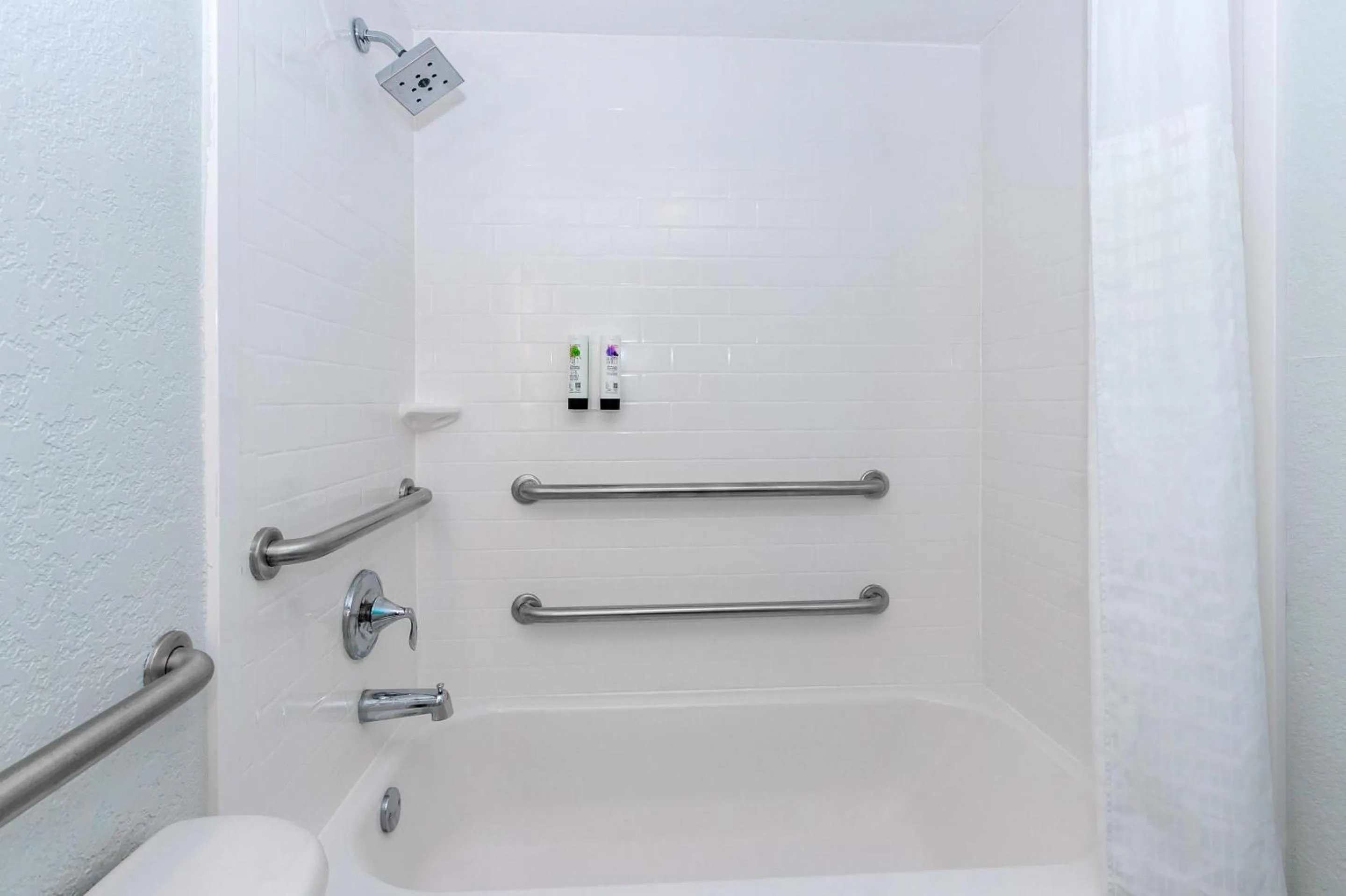 Bedroom in Dolphin Sands Clearwater Beach, an Ascend Collection Hotel