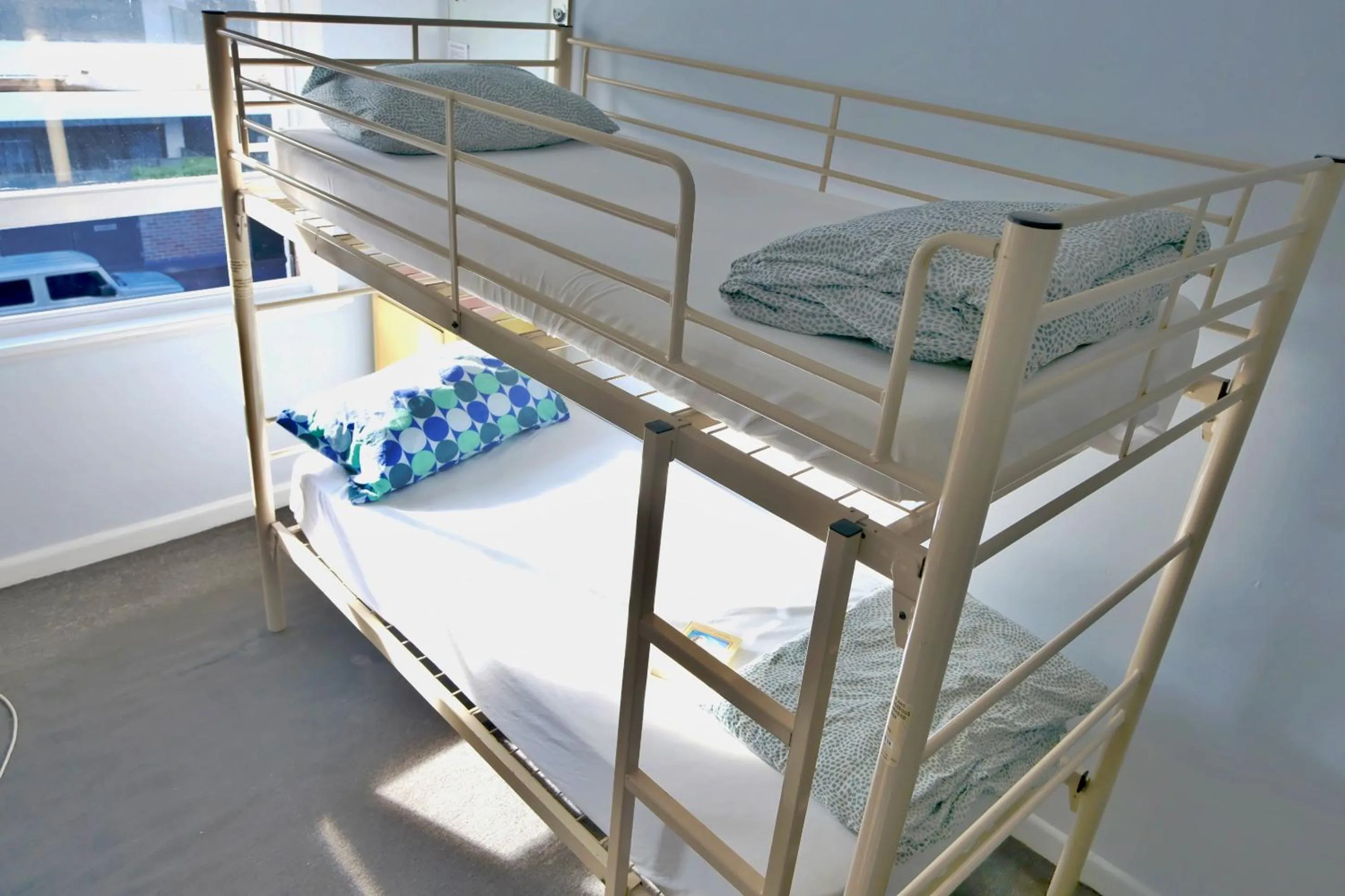 Bed in Pint On Punt Backpackers