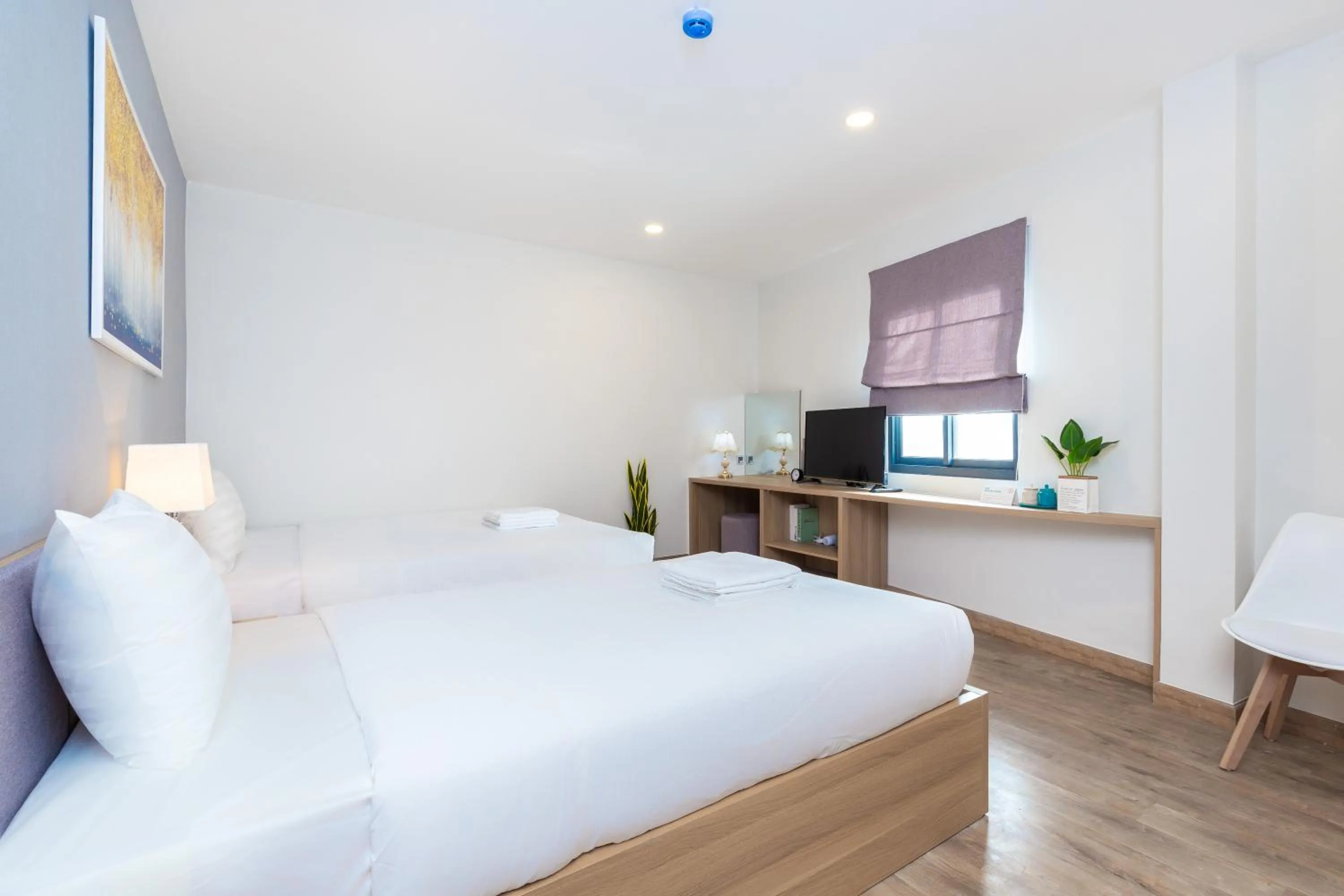 Bed in Cozrum Lux Hotel