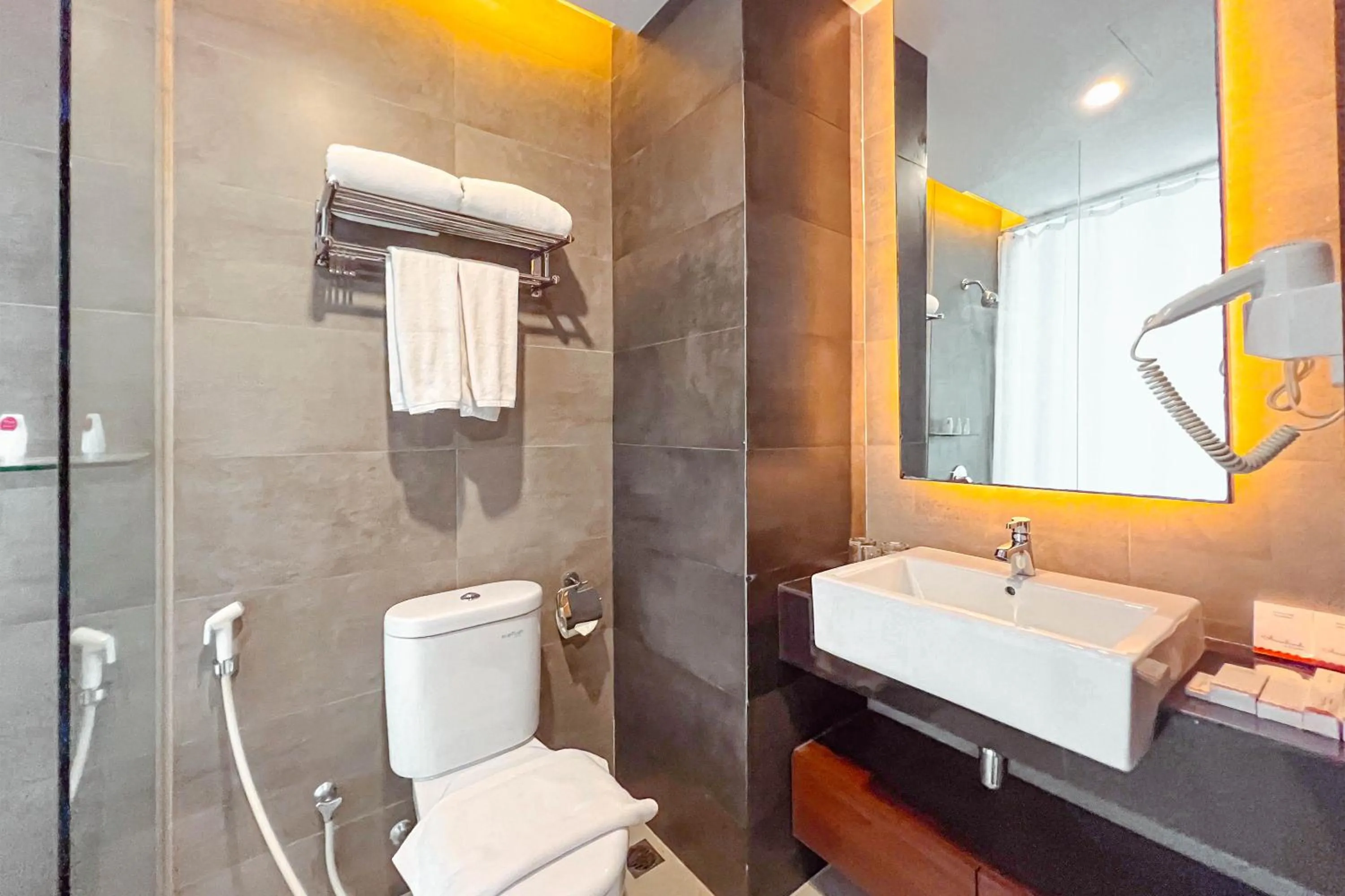 Bathroom in Asialink Hotel Batam by Prasanthi