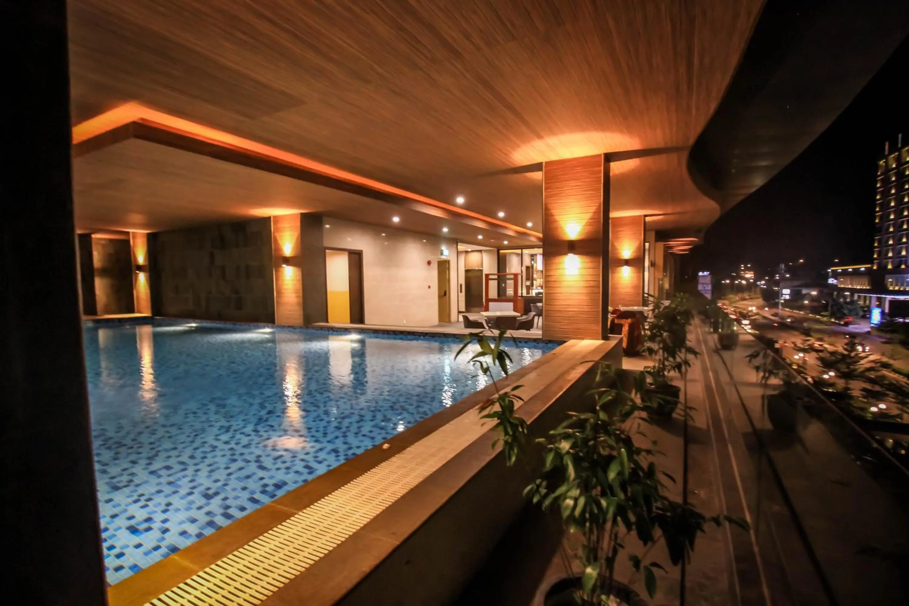 Swimming pool in Asialink Hotel Batam by Prasanthi