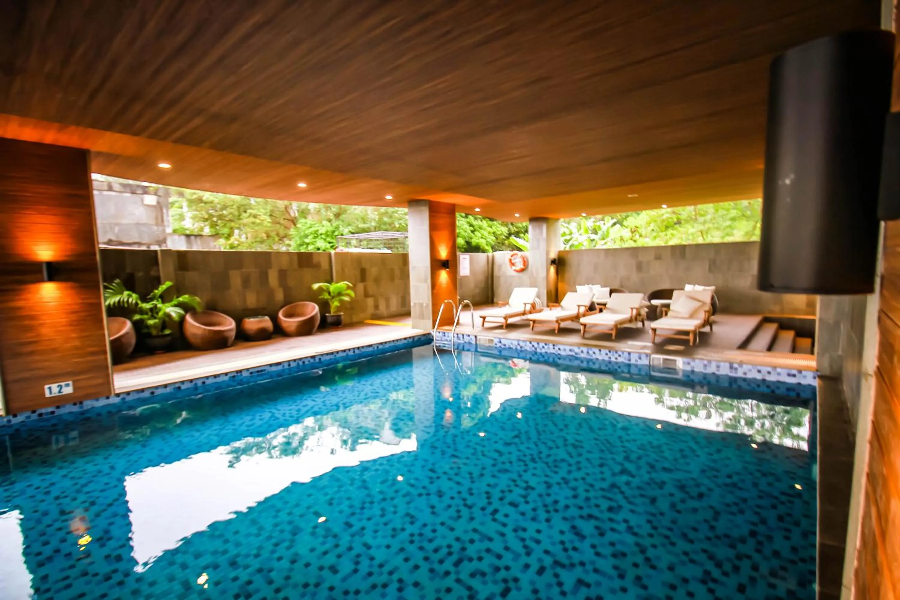 Swimming pool in Asialink Hotel Batam by Prasanthi