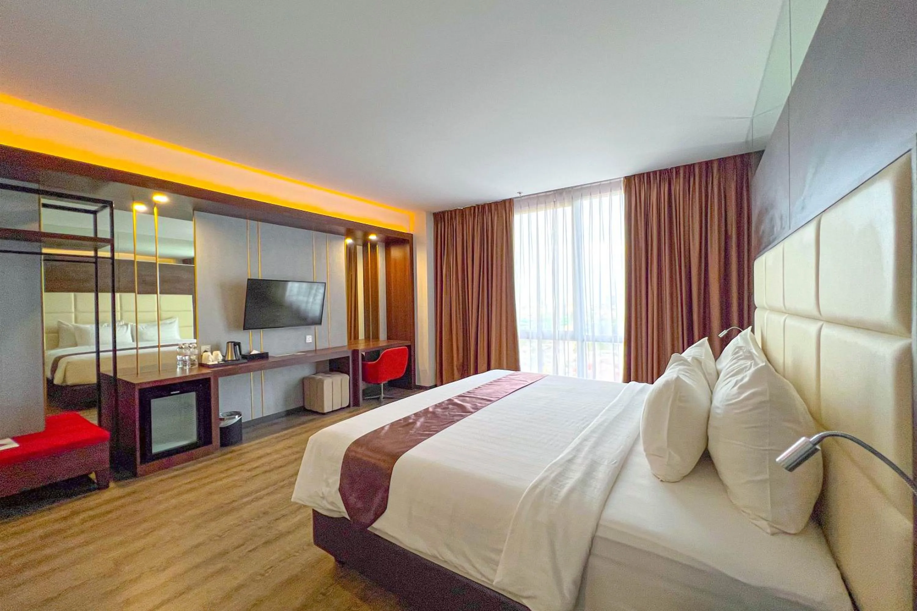 Bed in Asialink Hotel Batam by Prasanthi