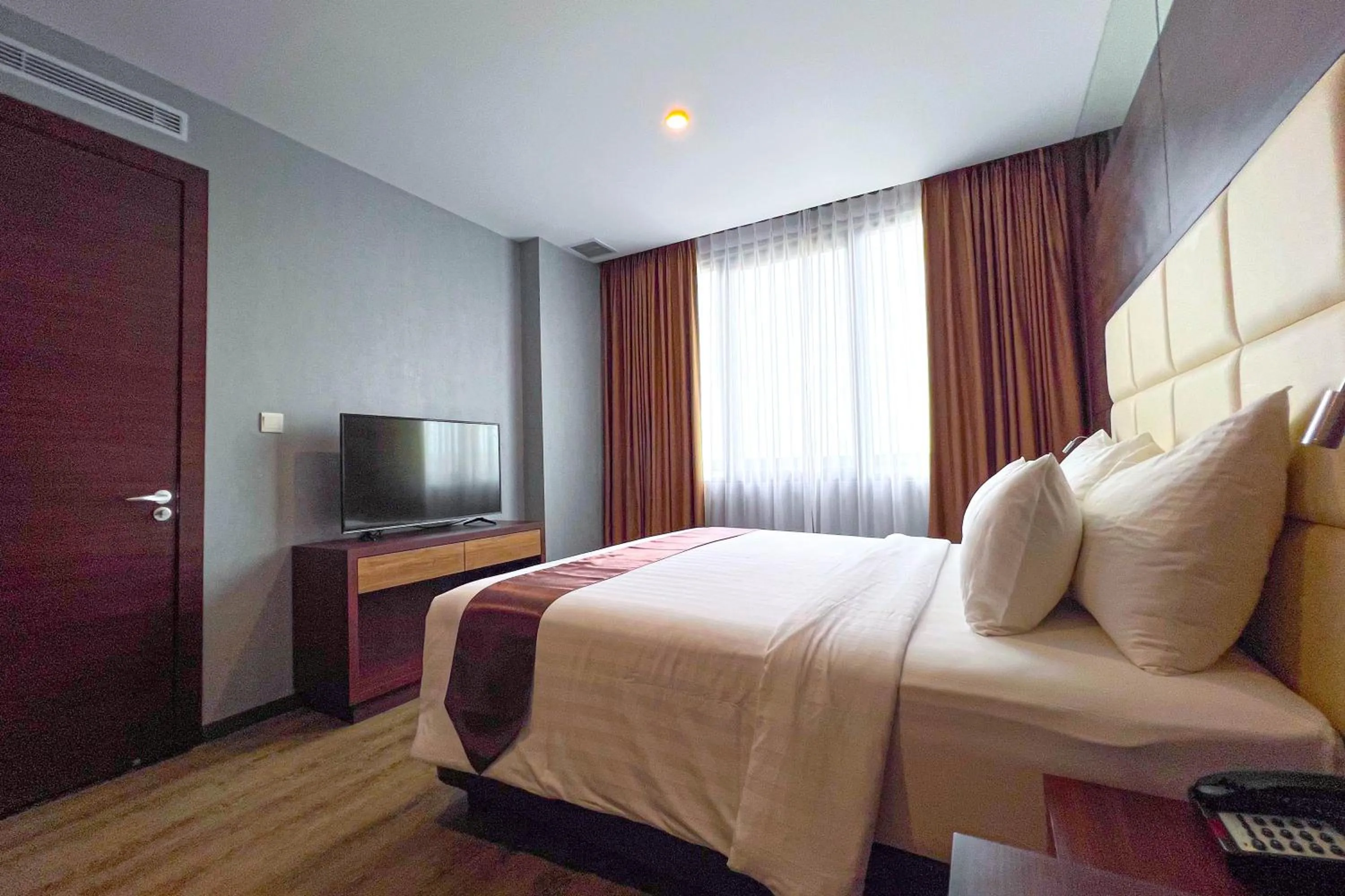 Bed in Asialink Hotel Batam by Prasanthi