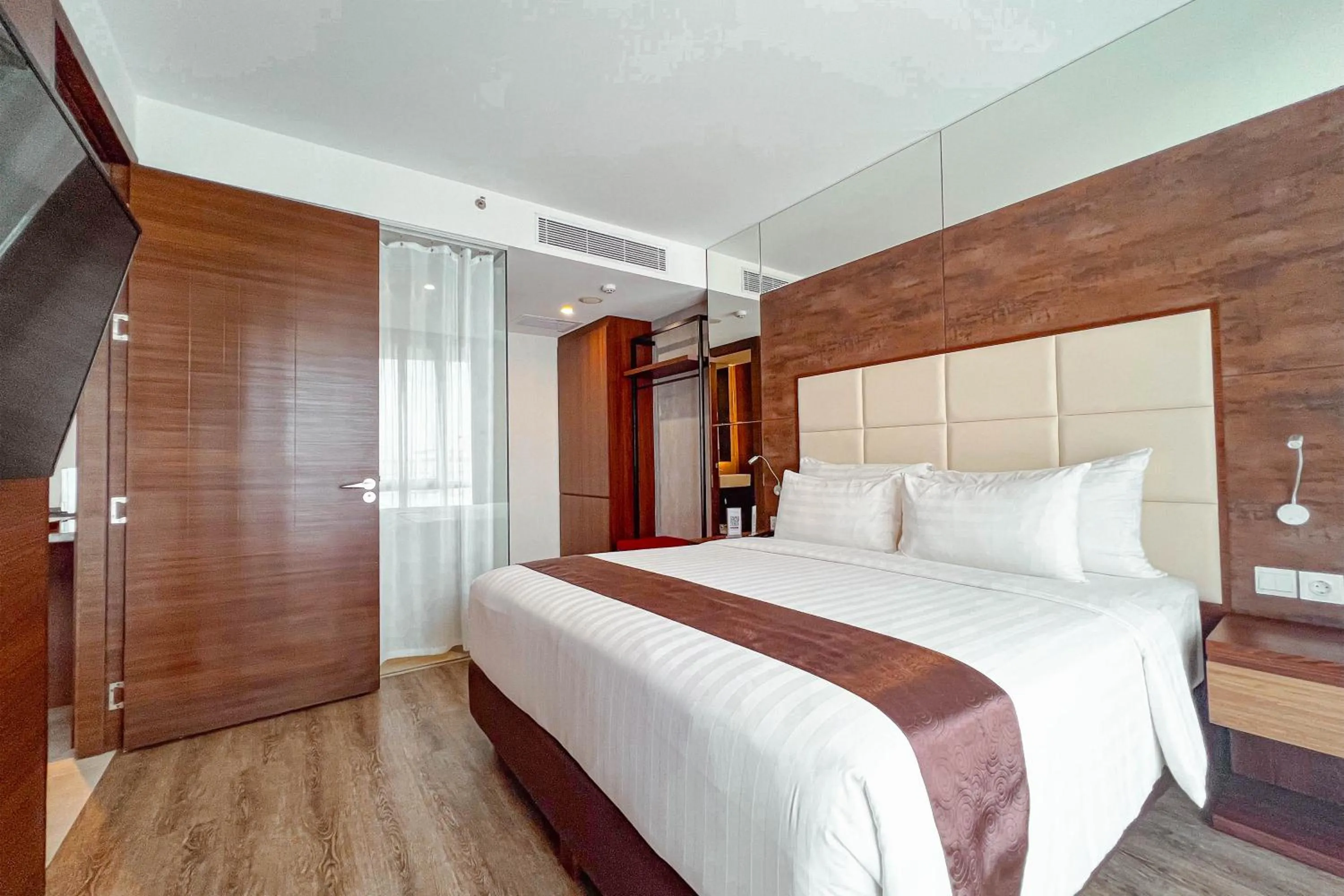 Bedroom, Bed in Asialink Hotel Batam by Prasanthi