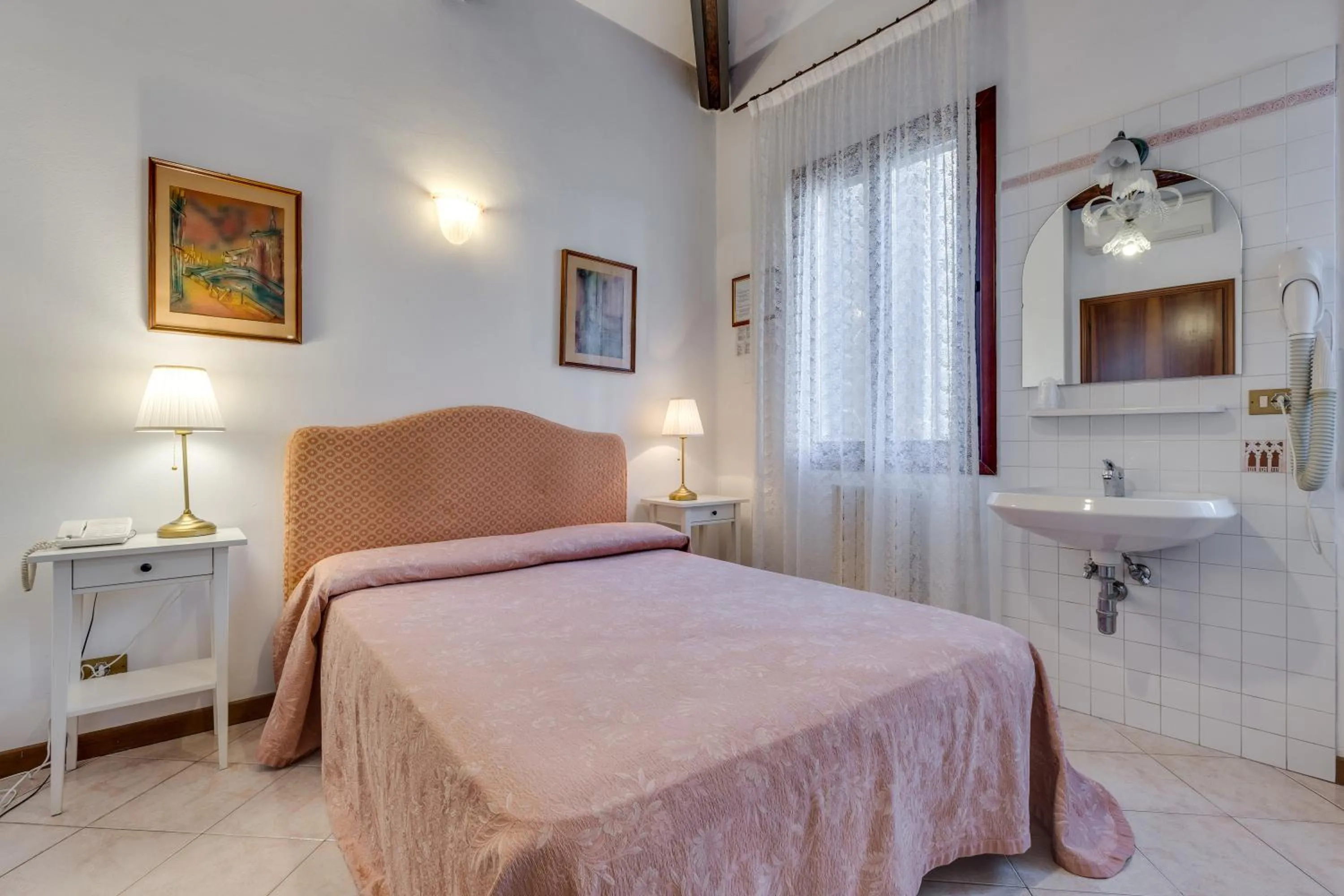 Bed in Hotel Bernardi Semenzato