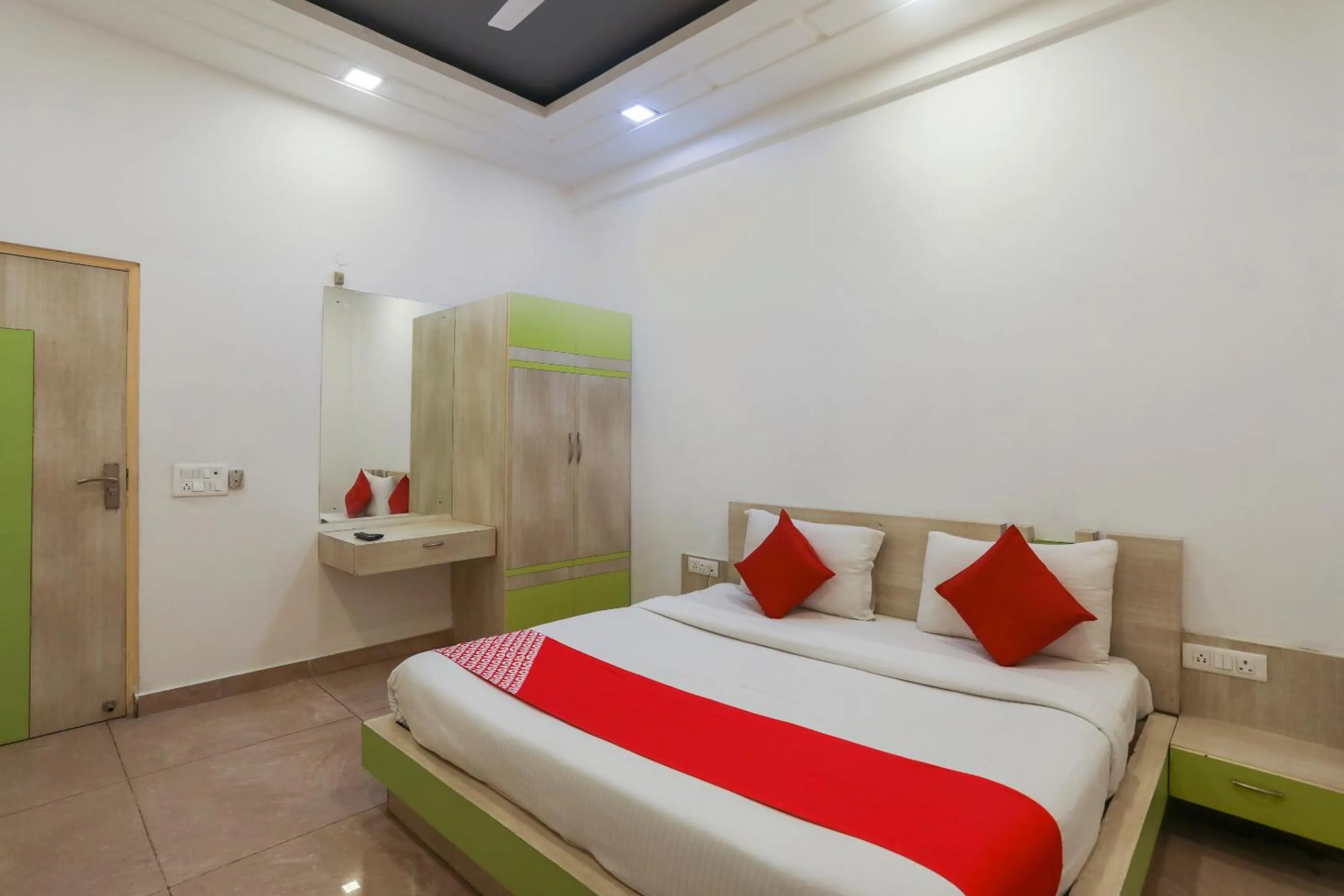 Bedroom in OYO Cladis Near Mall Of India