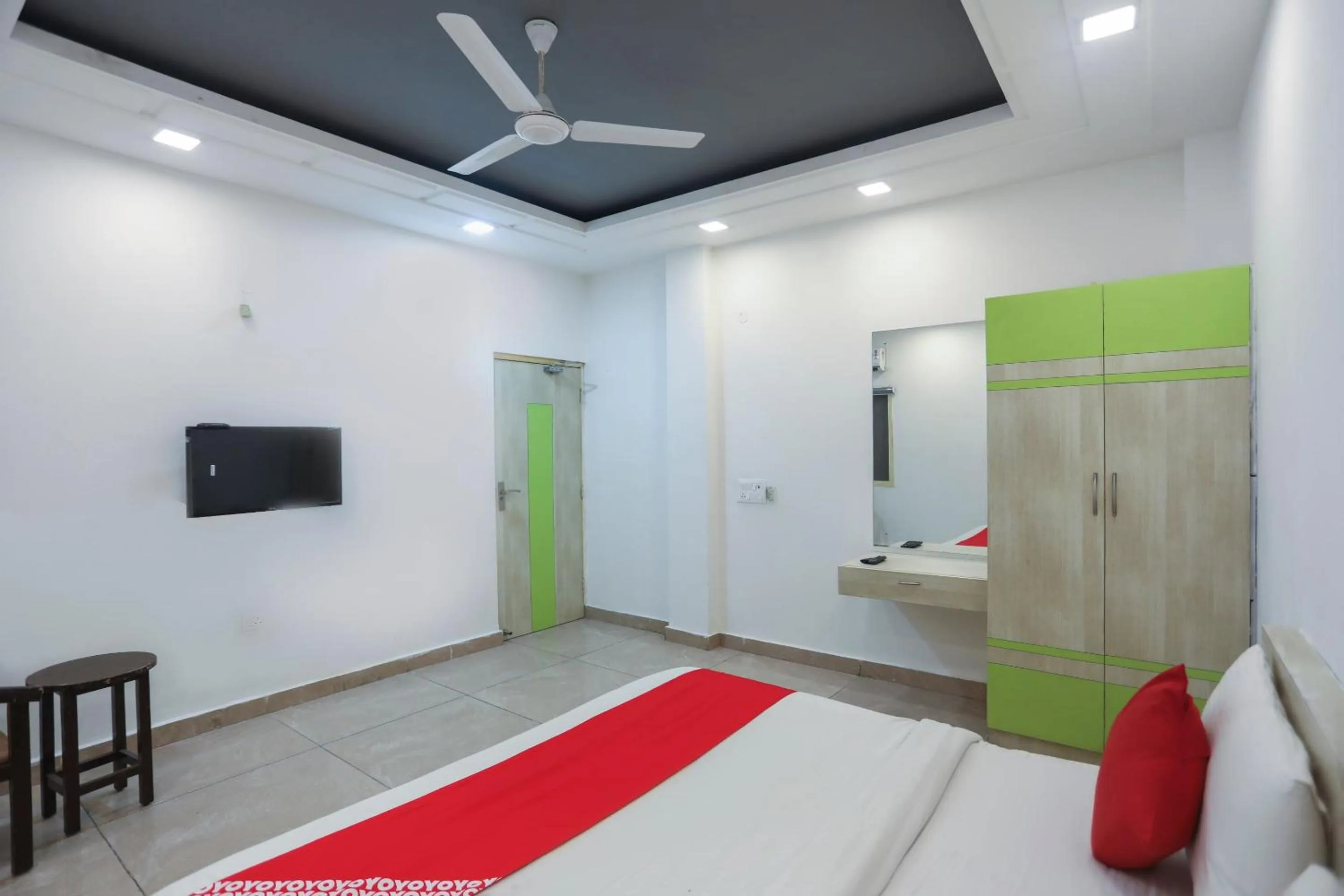 Bedroom in OYO Cladis Near Mall Of India