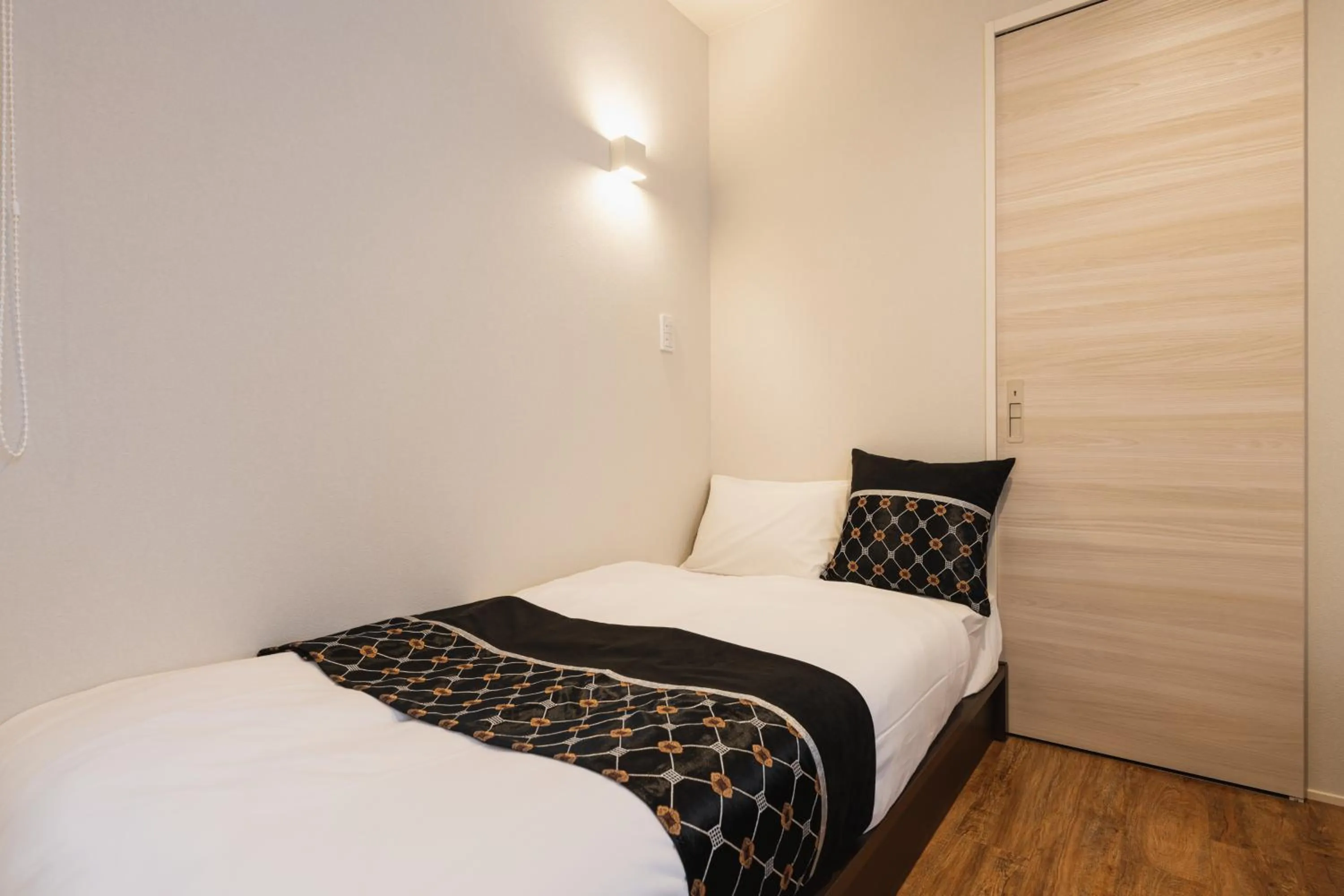 Bed in GRAND BASE Nagasaki