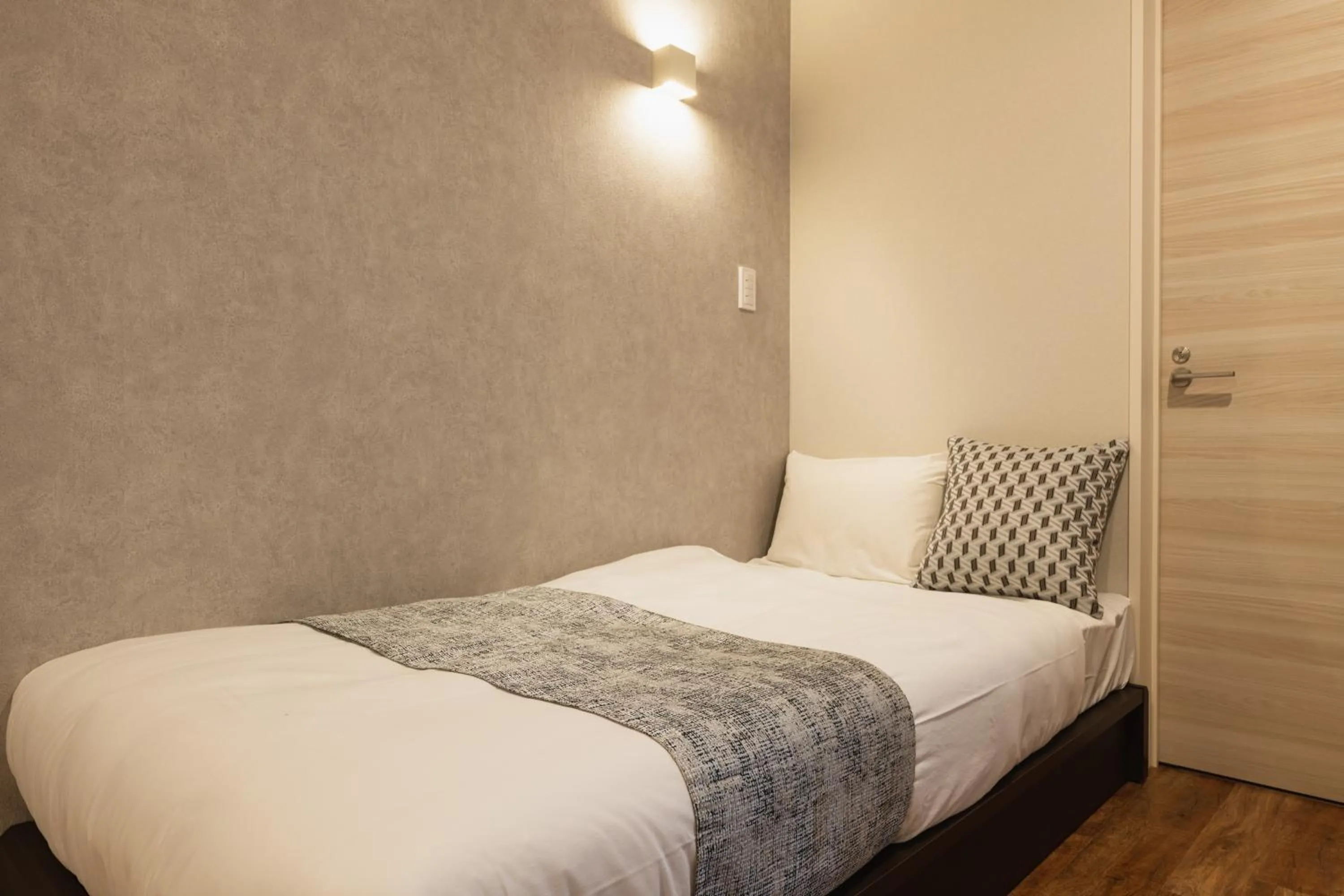 Bed in GRAND BASE Nagasaki