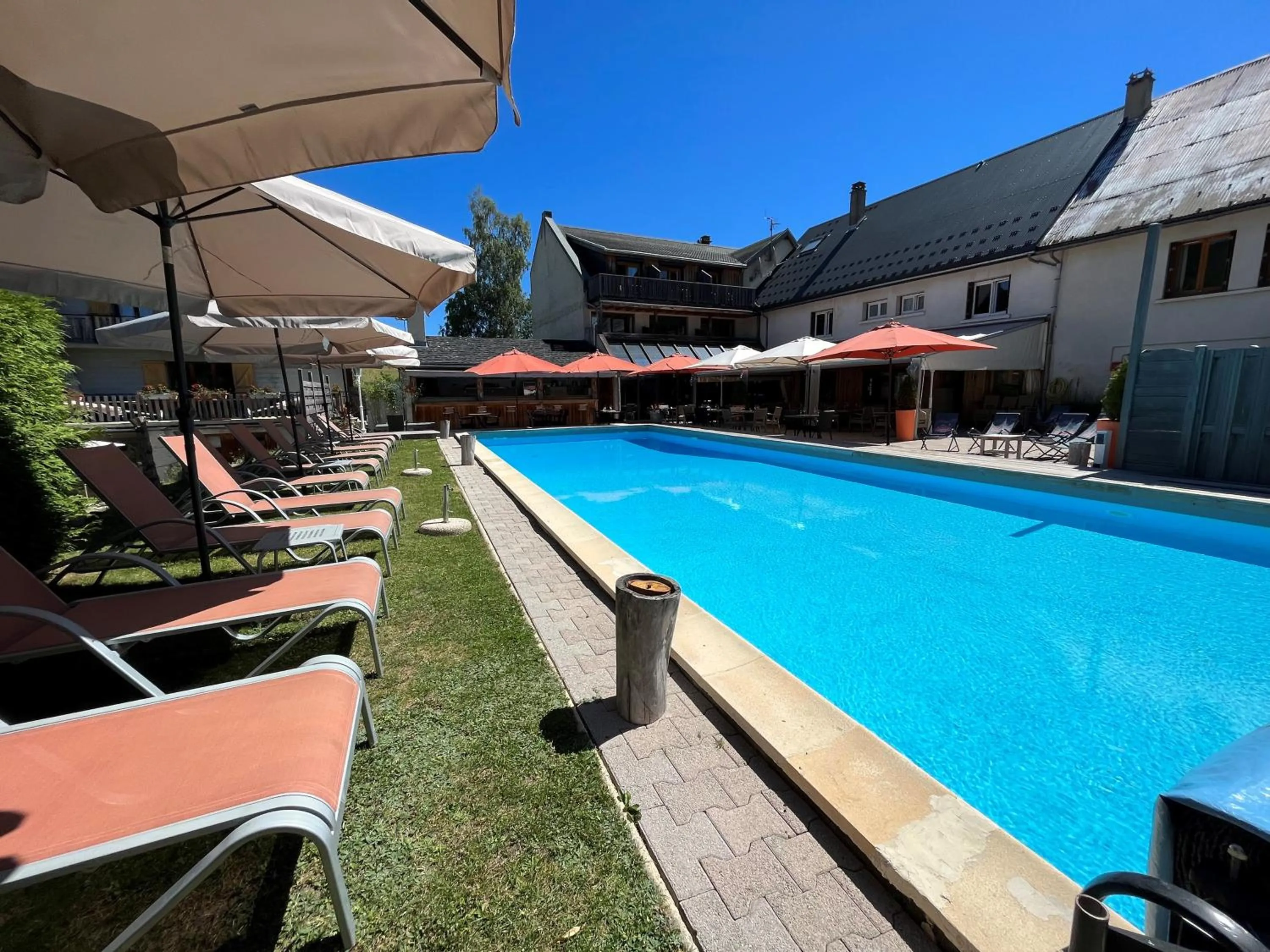 Patio, Swimming Pool in Hôtel et Spa les Clarines