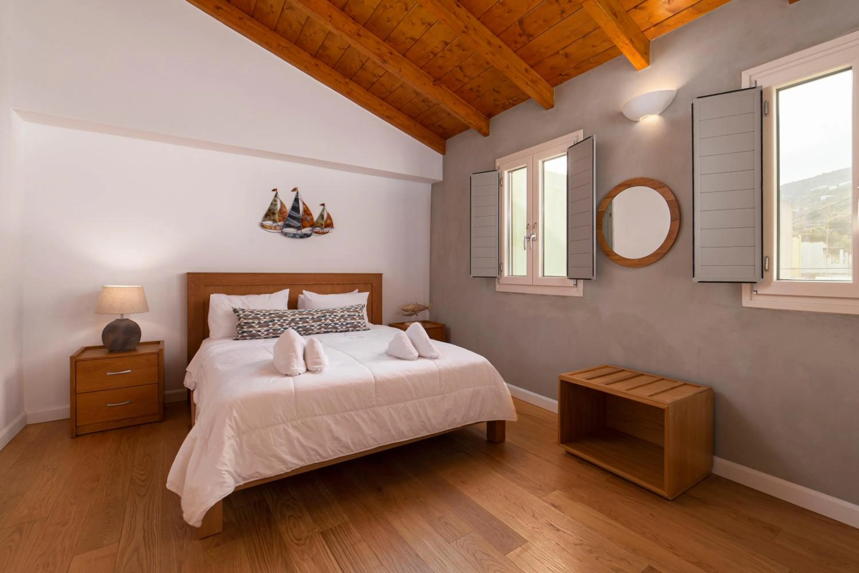 Bed in Andros 4 All Seasons Villas & Suites