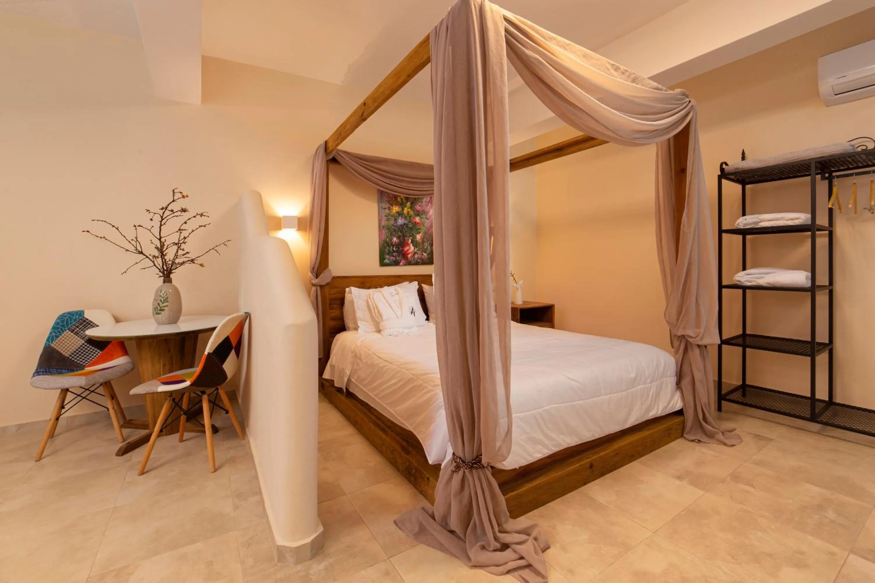 Bed in Andros 4 All Seasons Villas & Suites