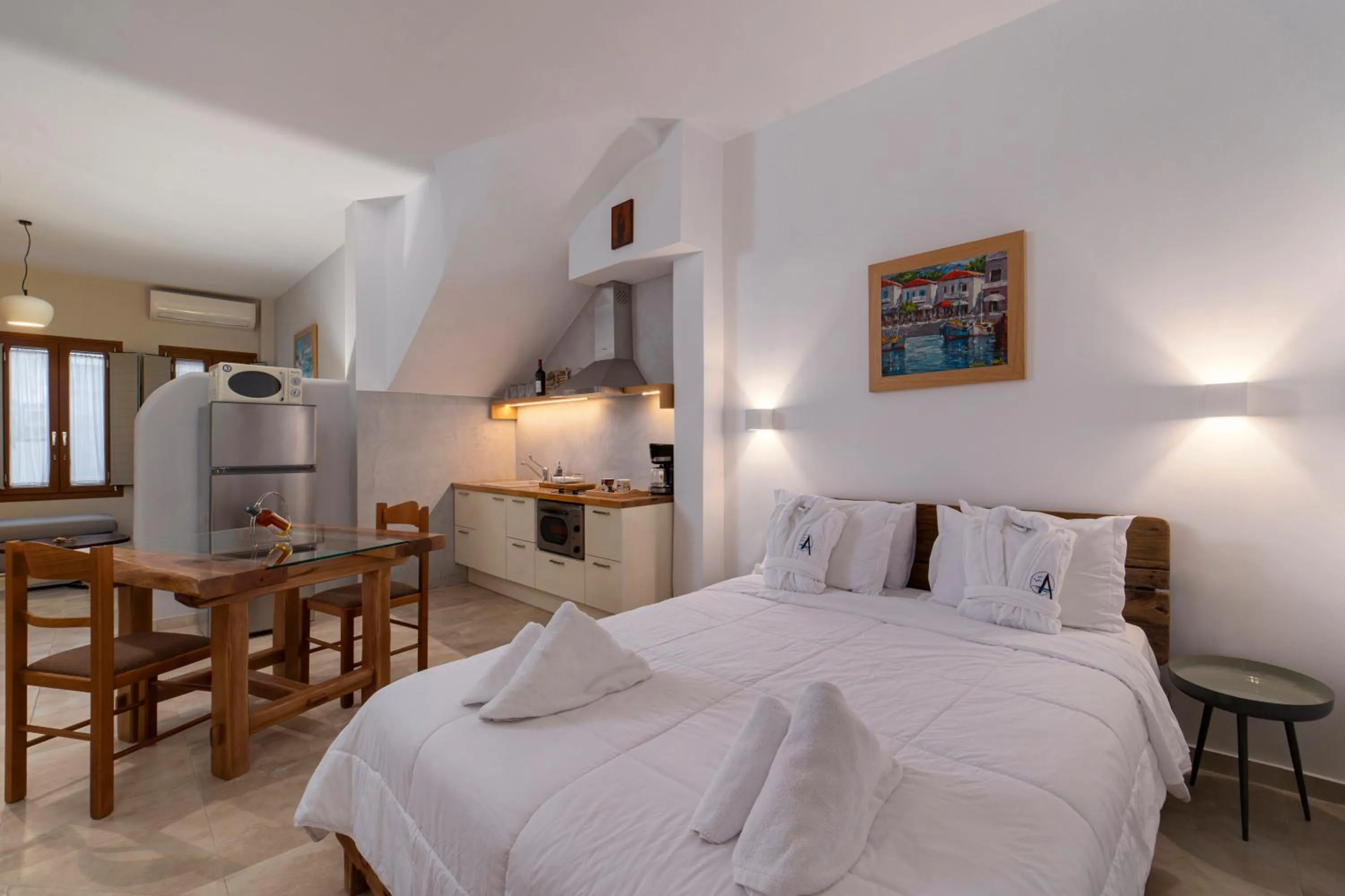 Bed in Andros 4 All Seasons Villas & Suites