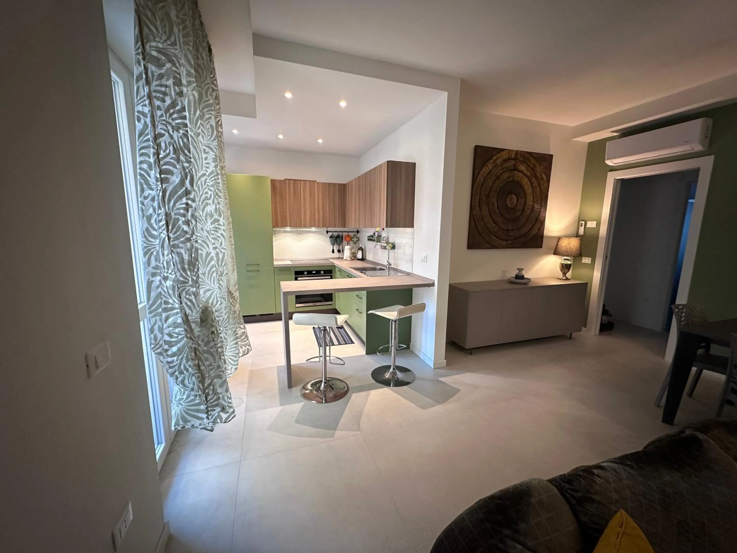 Kitchen or kitchenette, Bed in La Villa Desenzano